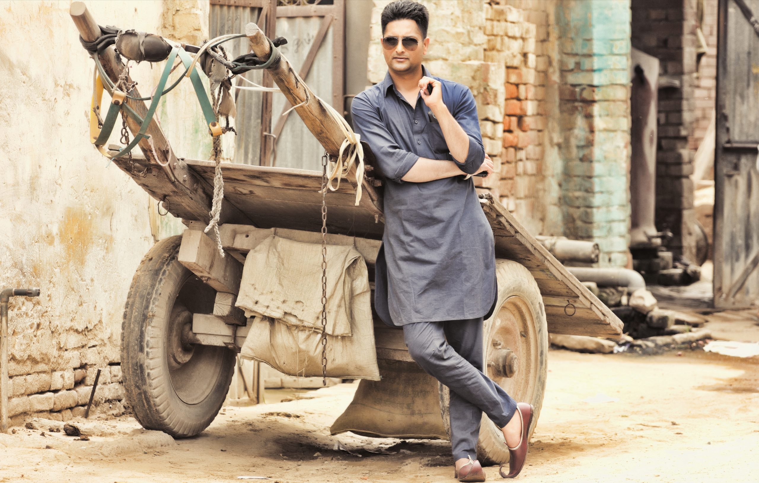 A model posing near a trolley