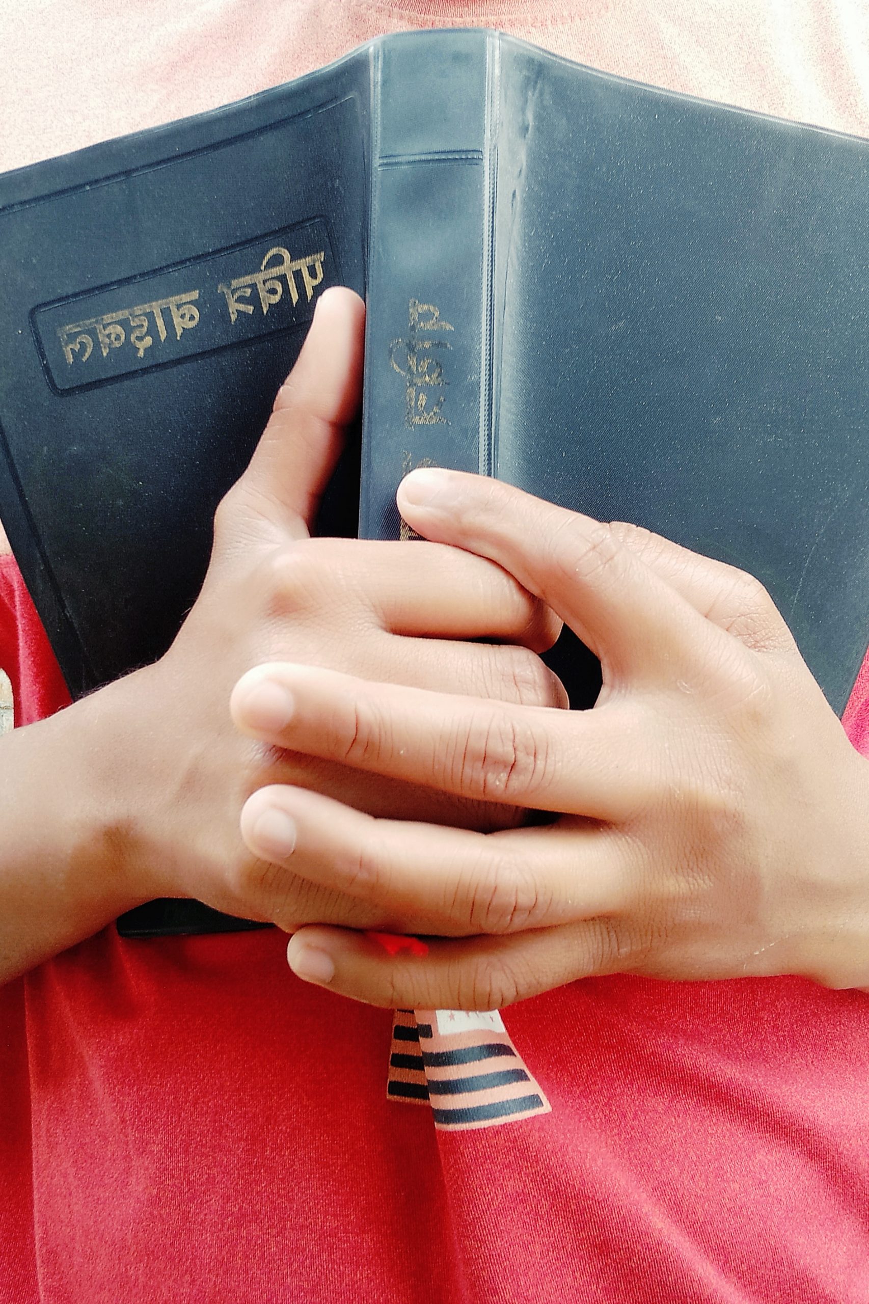 A religious book in hands