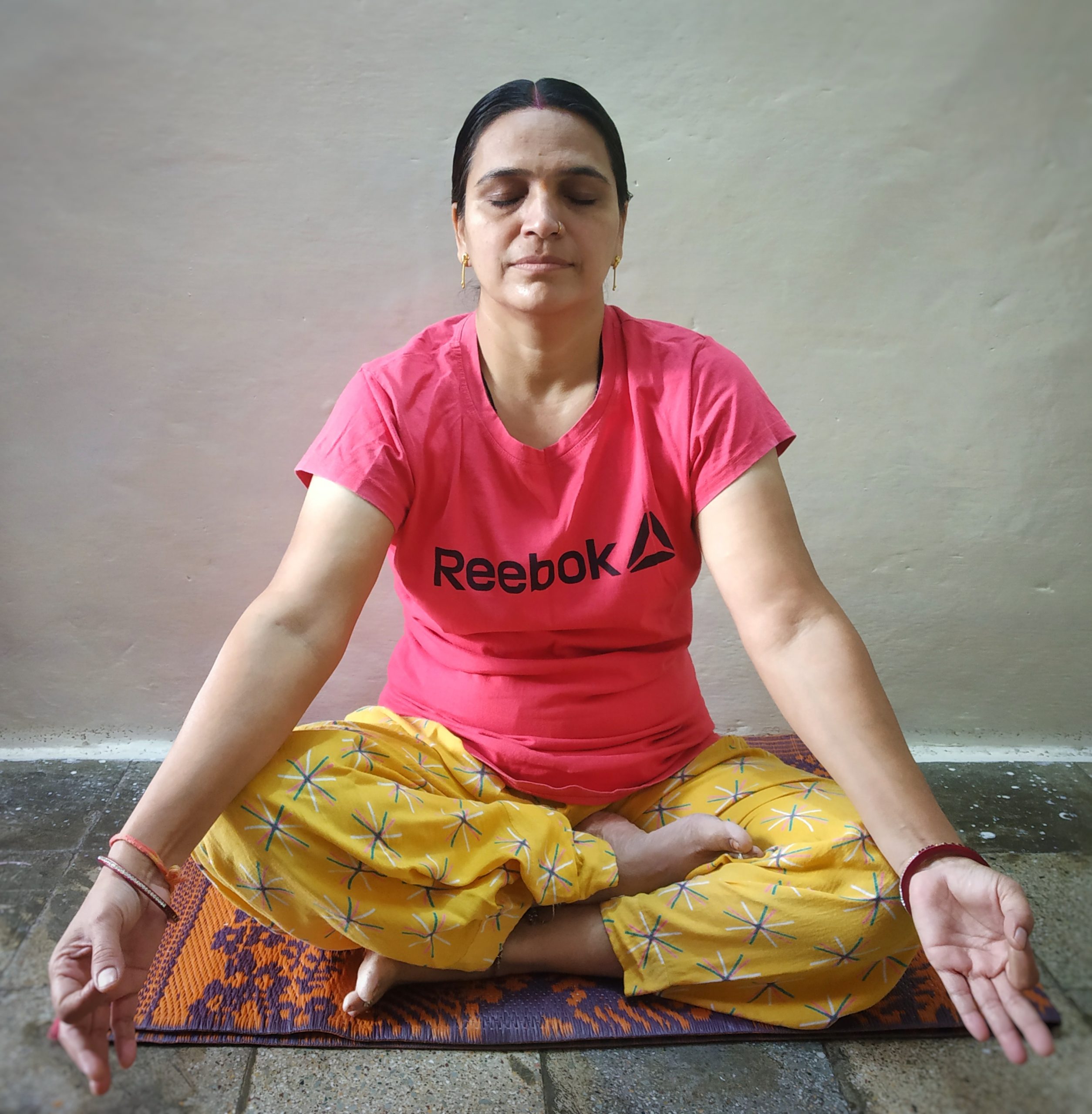 A woman practicing Yoga