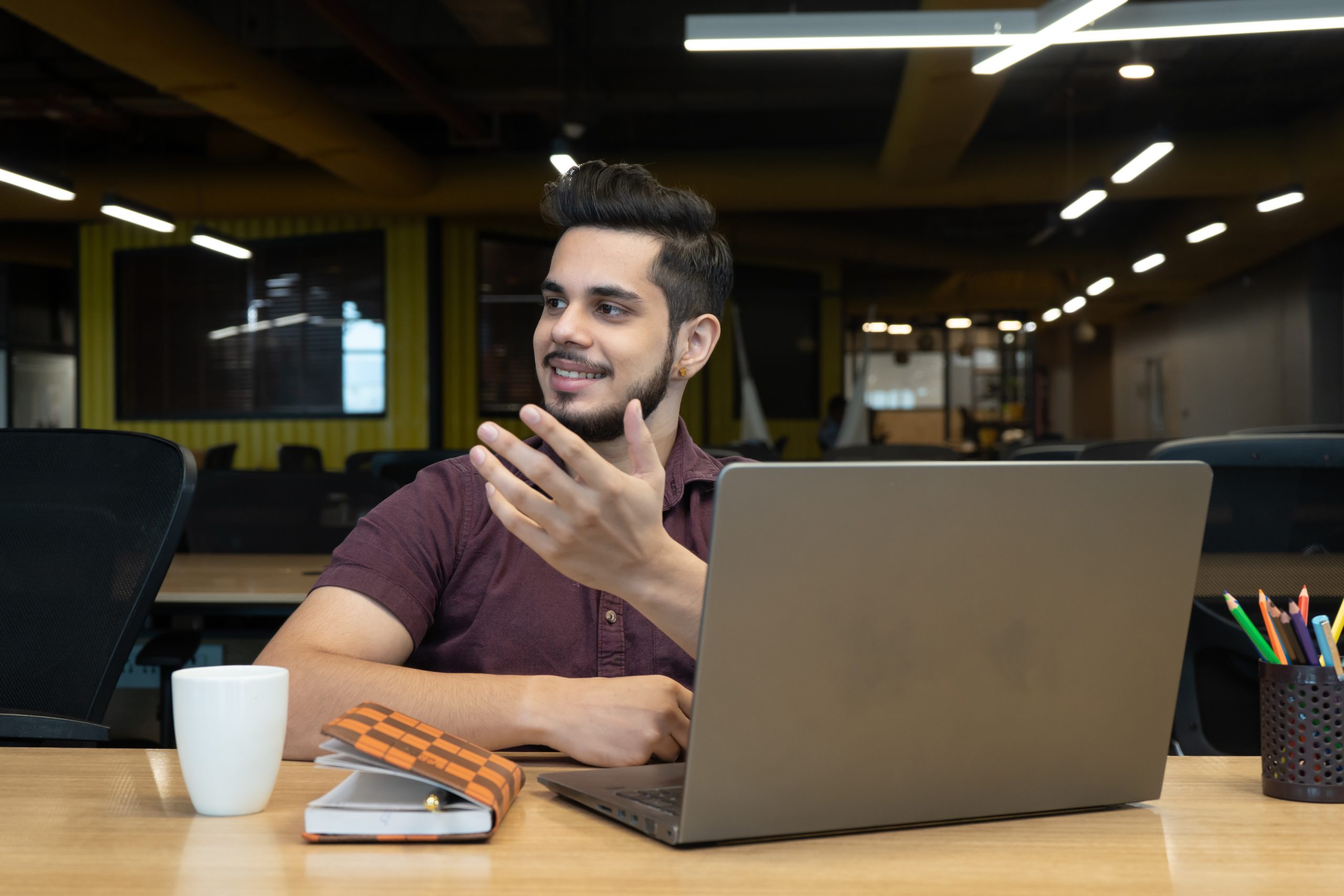 An employee smiling while working