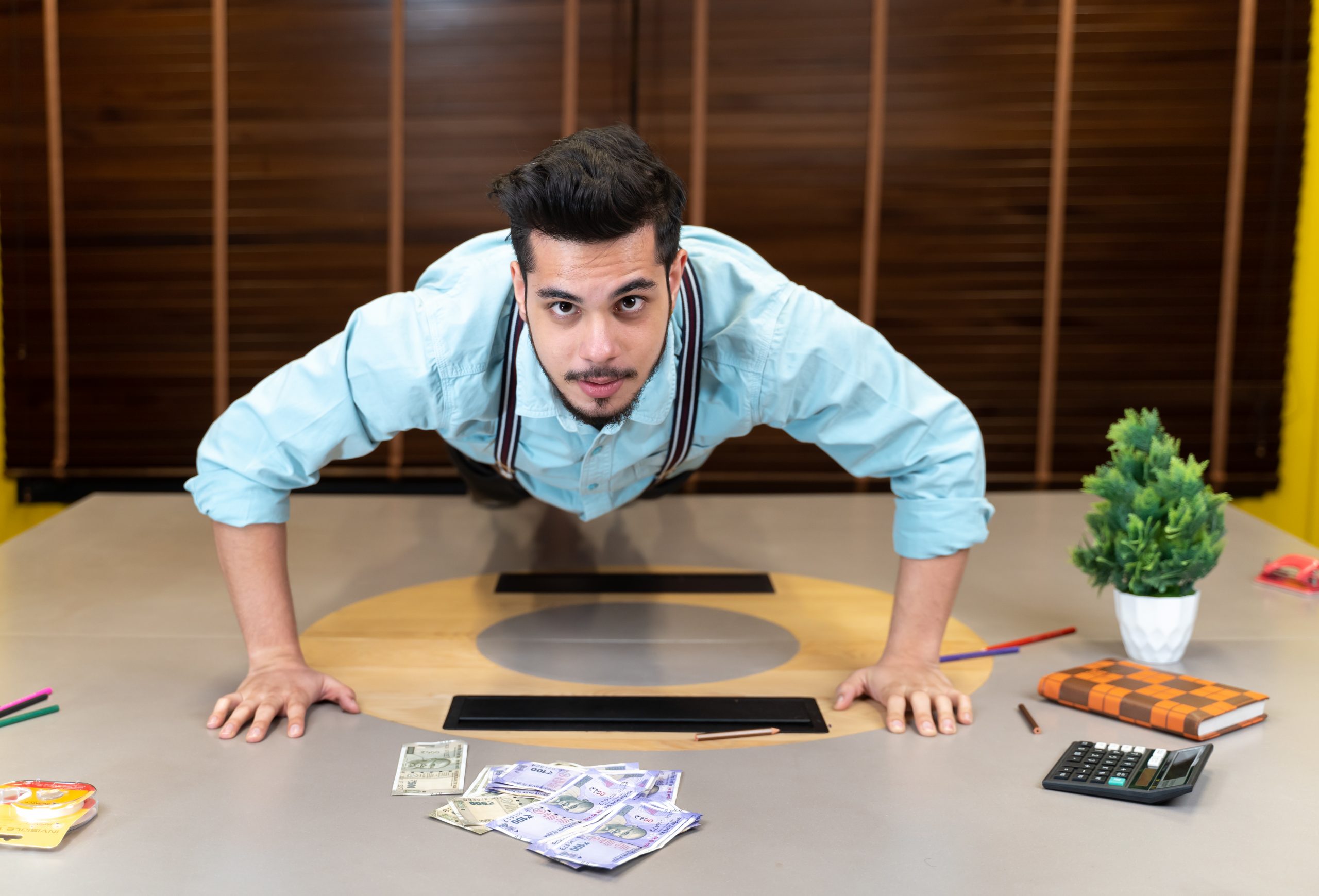 Businessman exercising in office