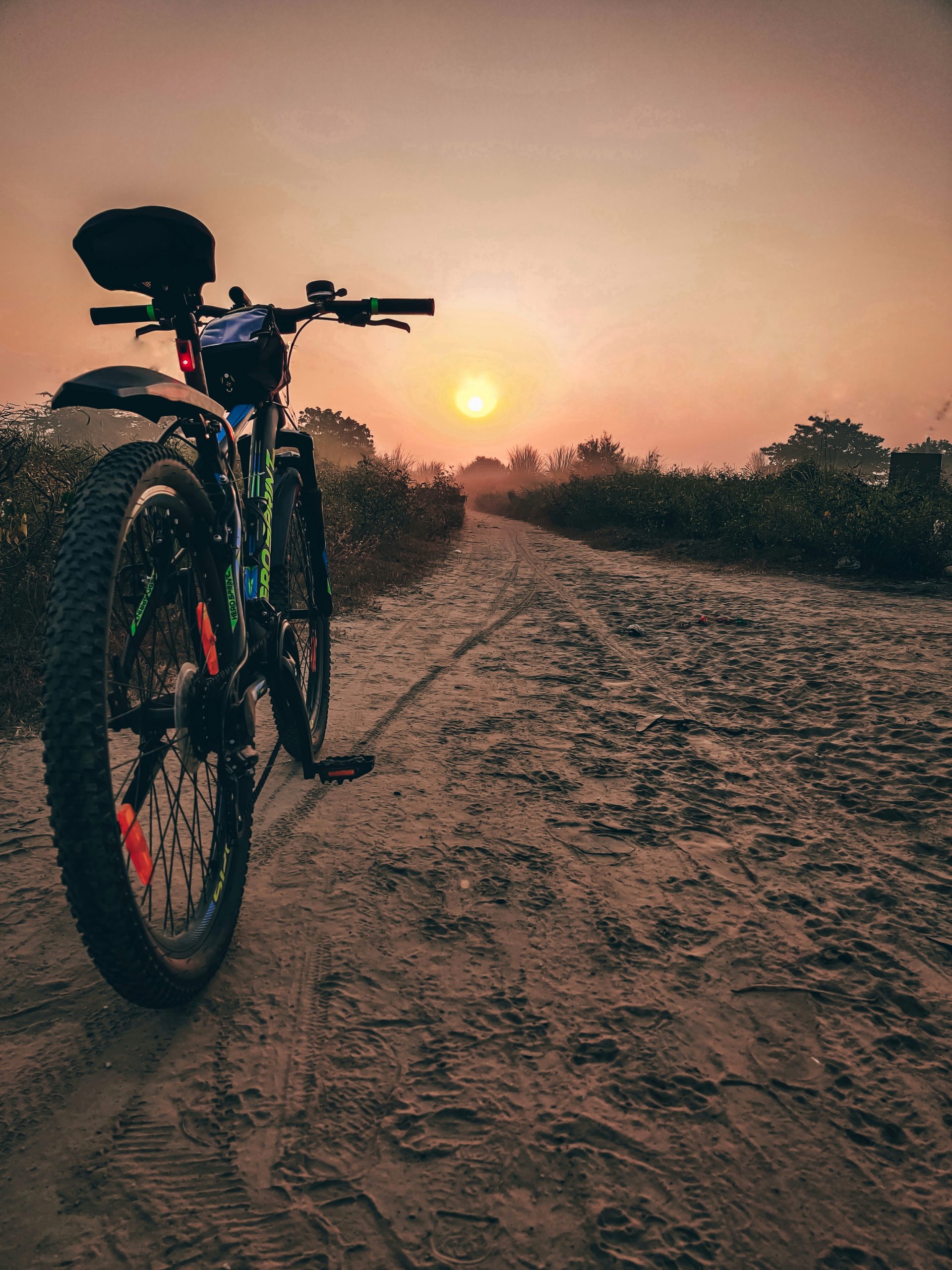 A bicycle on a dirt road