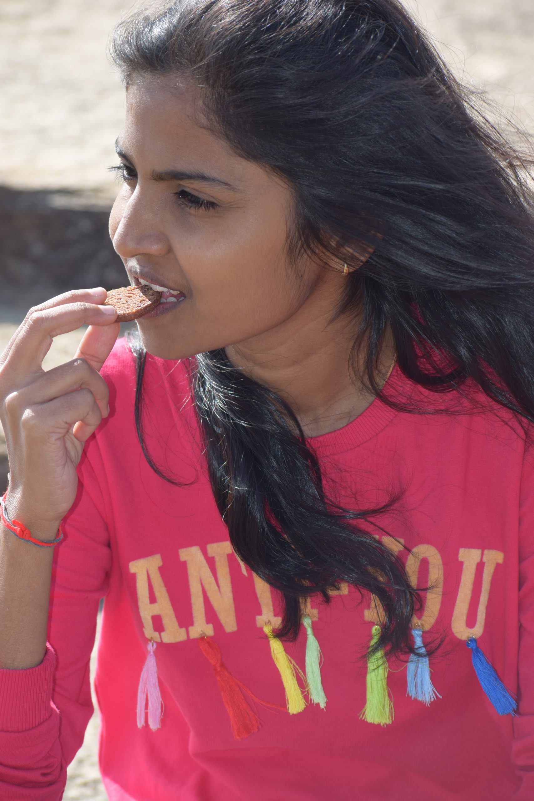 Girl eating biscuit