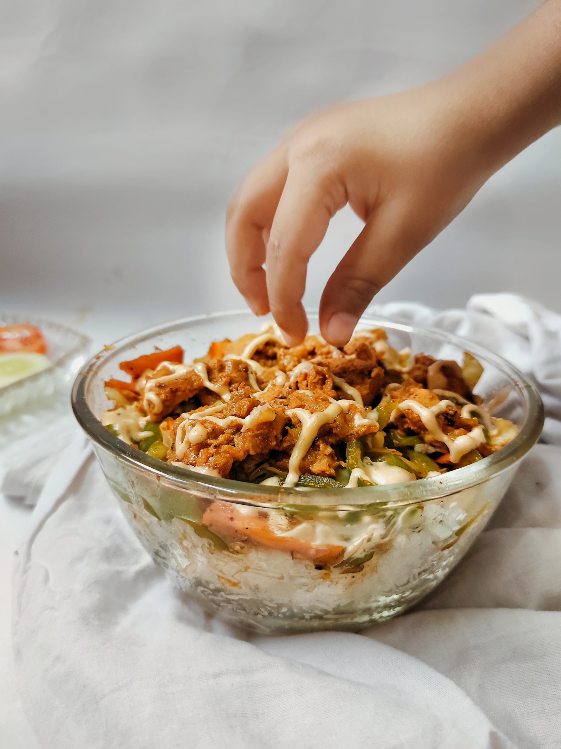 Hand on a food bowl