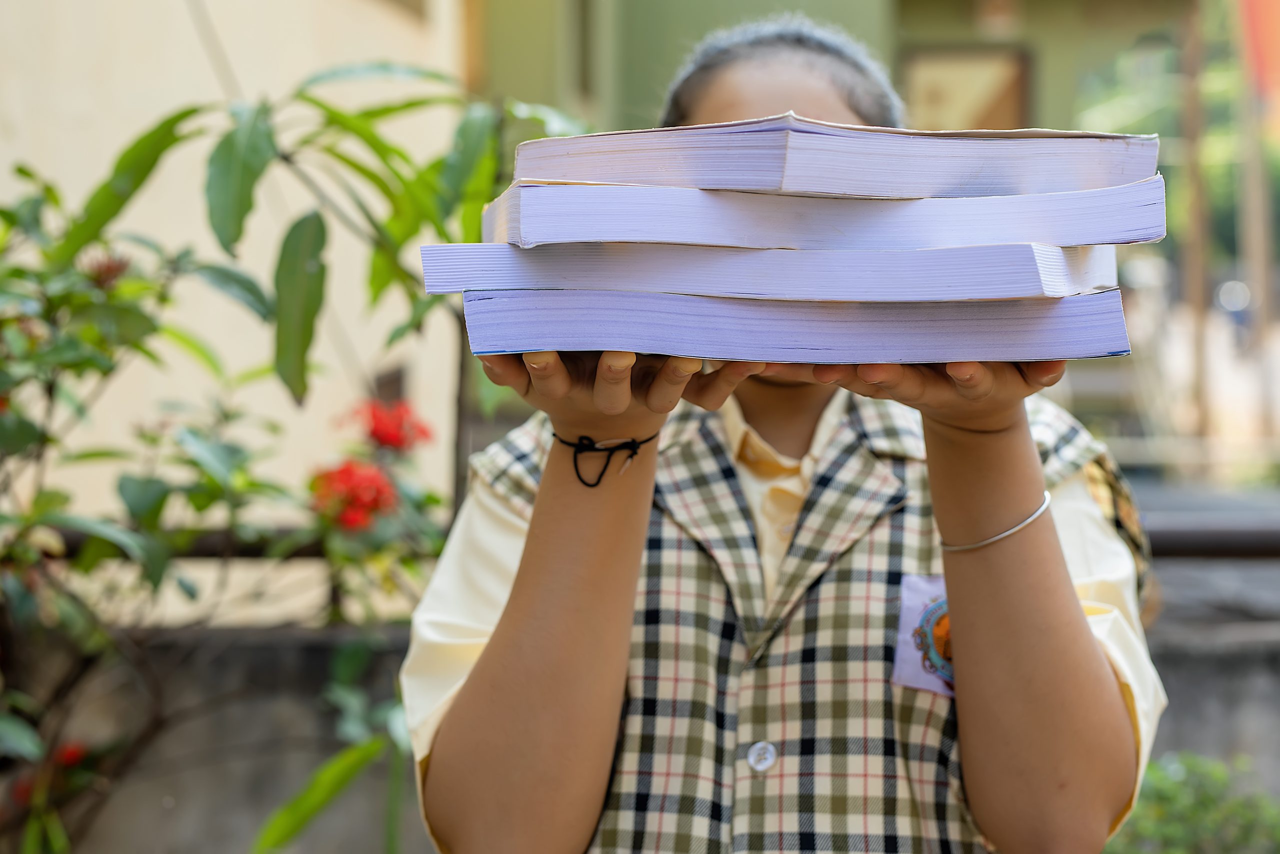 Holding book in hand