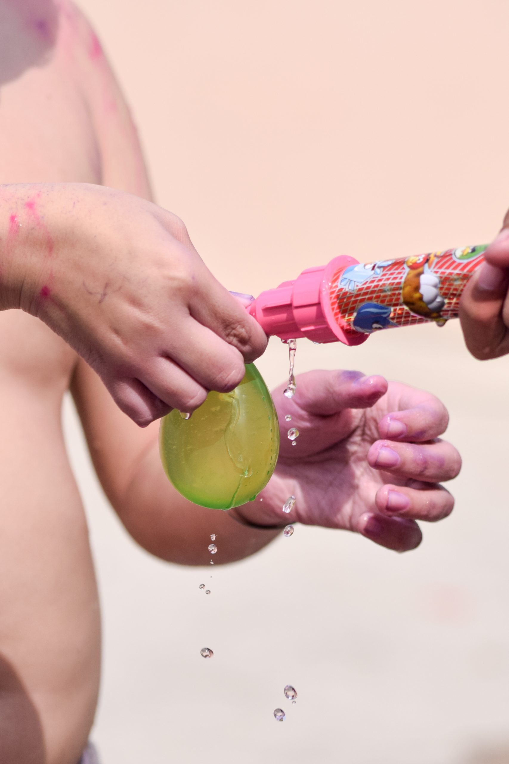 Kids playing with water balloon