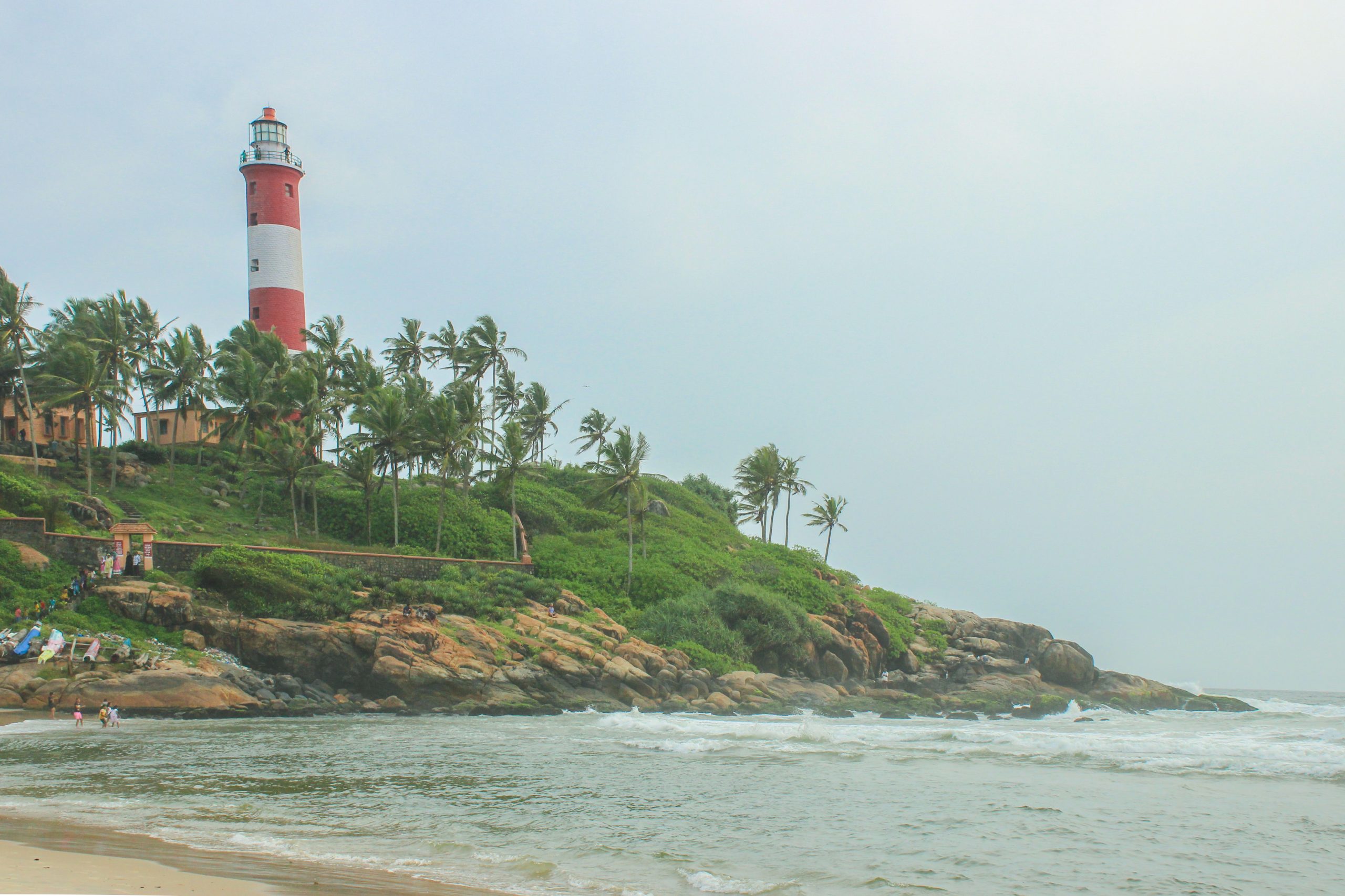 Kovalam Light House on a beach in Kerala