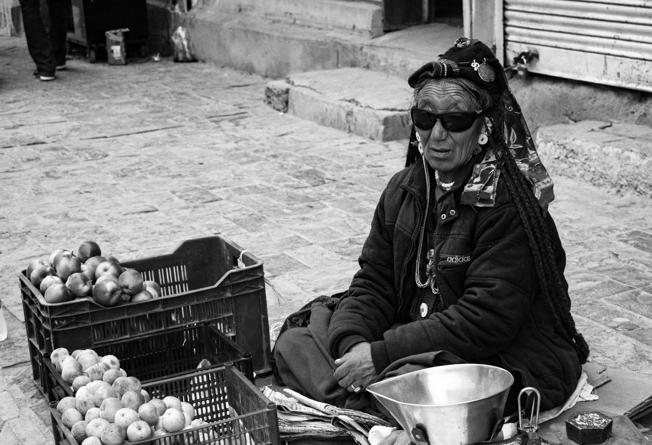 A lady selling fruits on the street