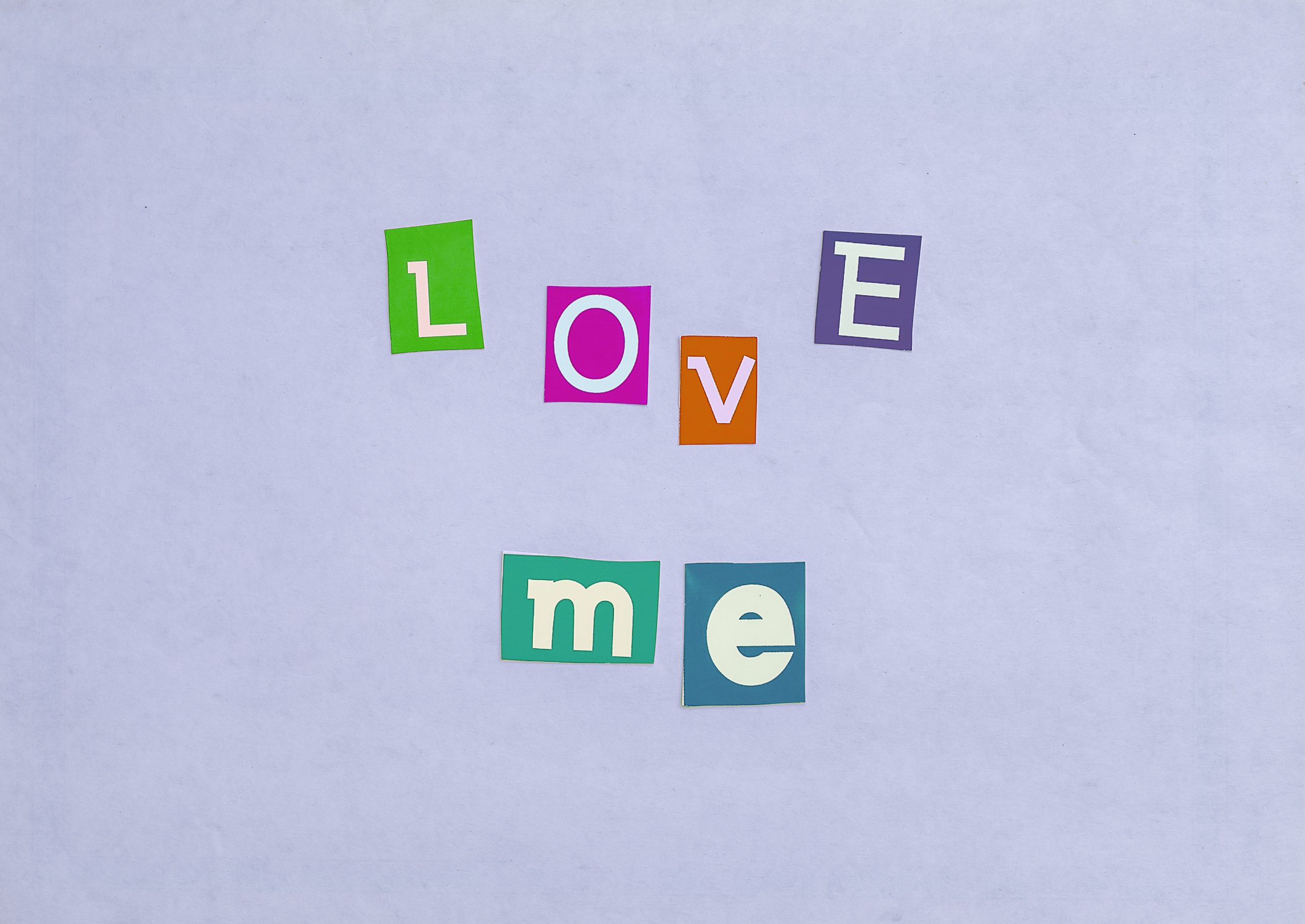 Love me written with stickers