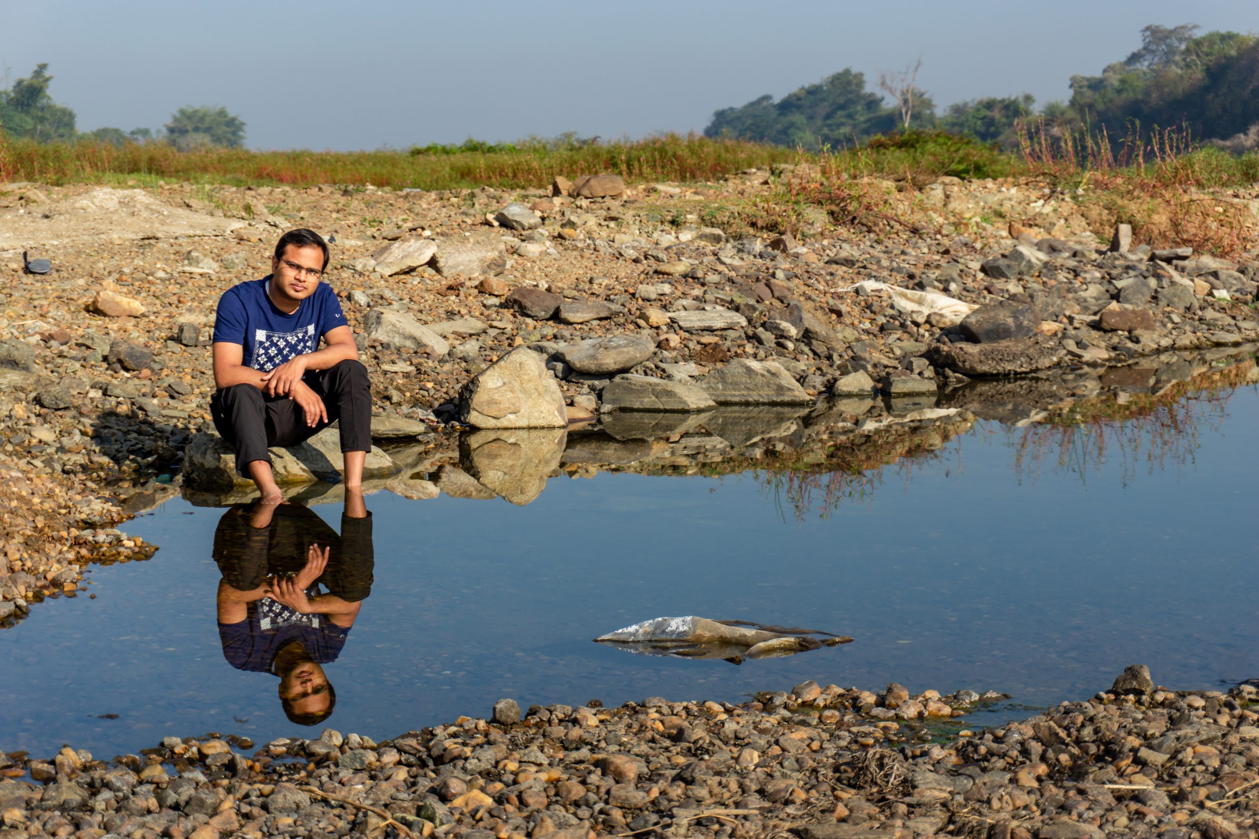 Man sitting on the rock