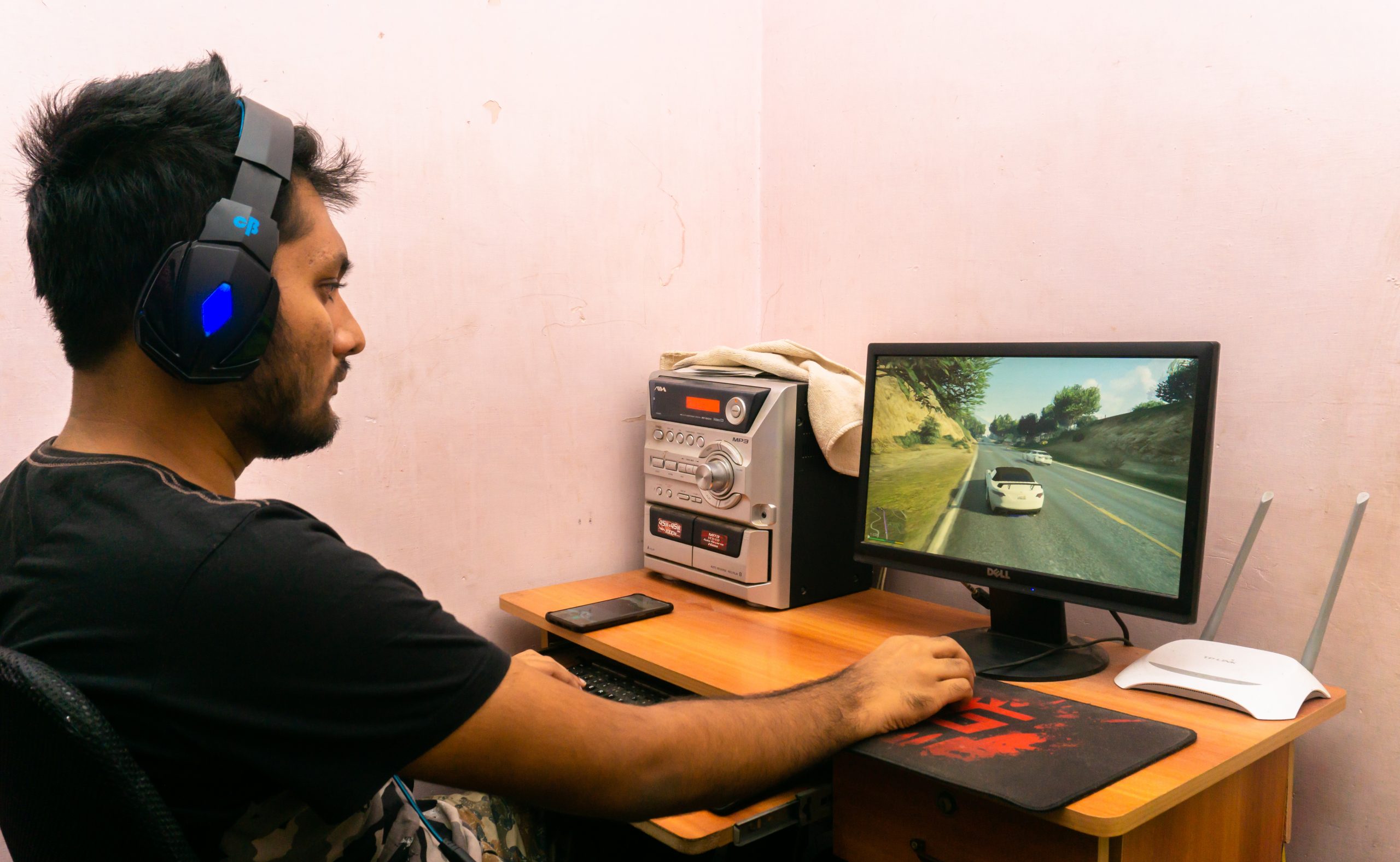 man playing video gmae on desktop