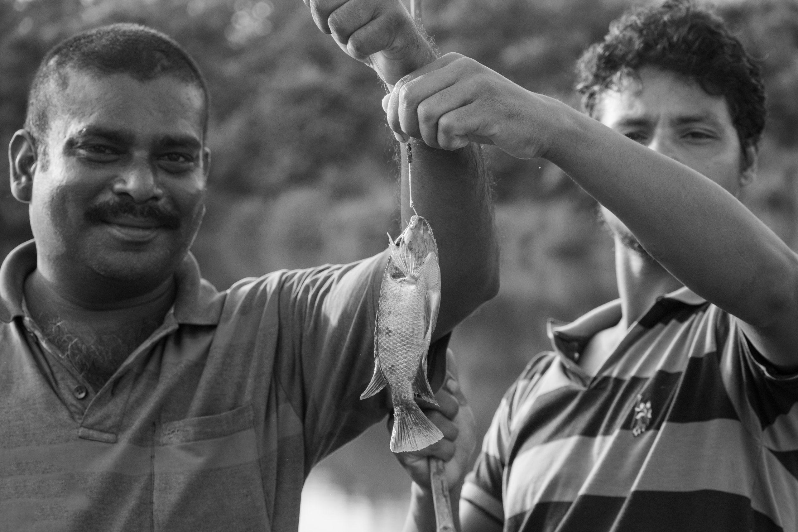 Men happy after fishing