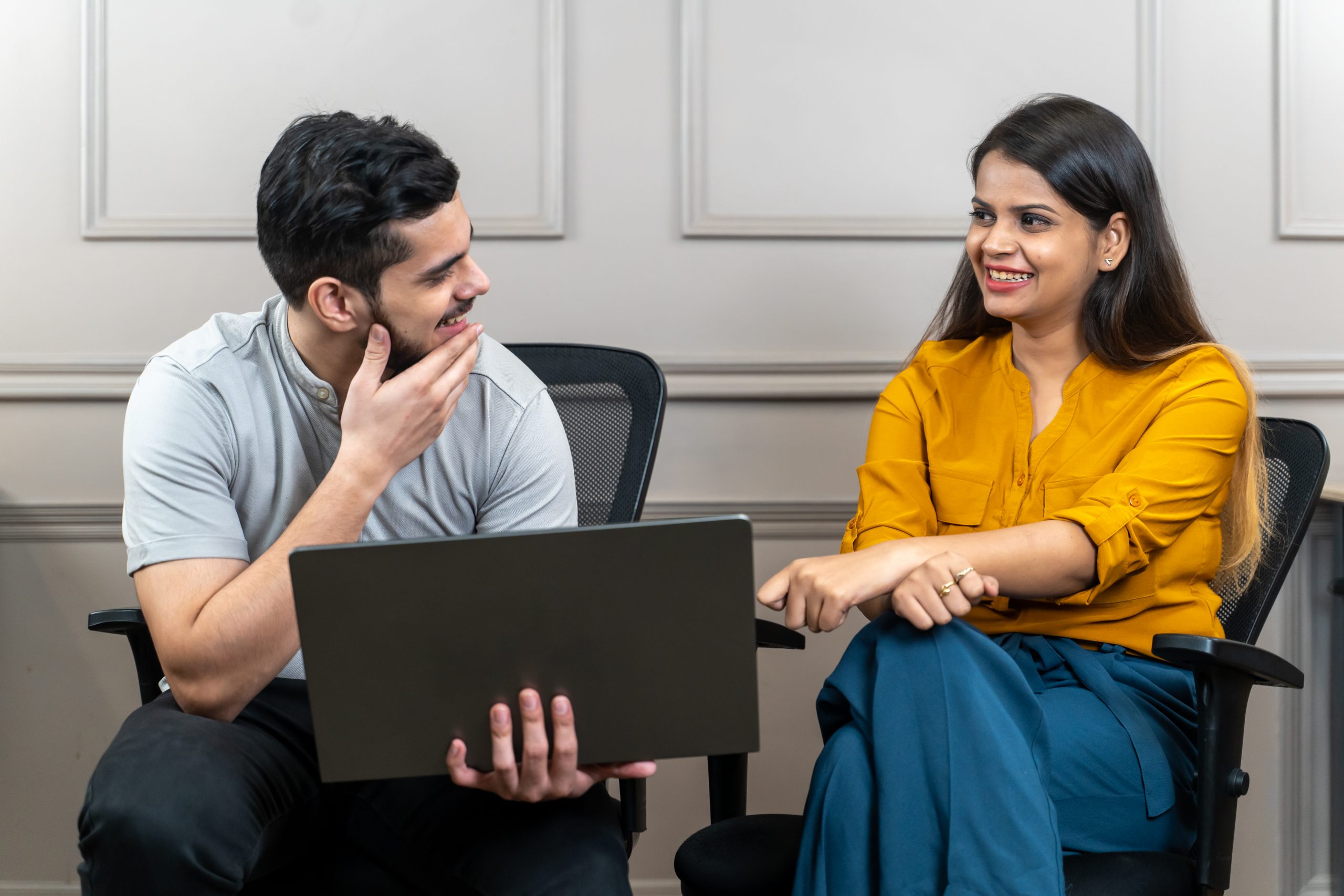 Office employees gossiping