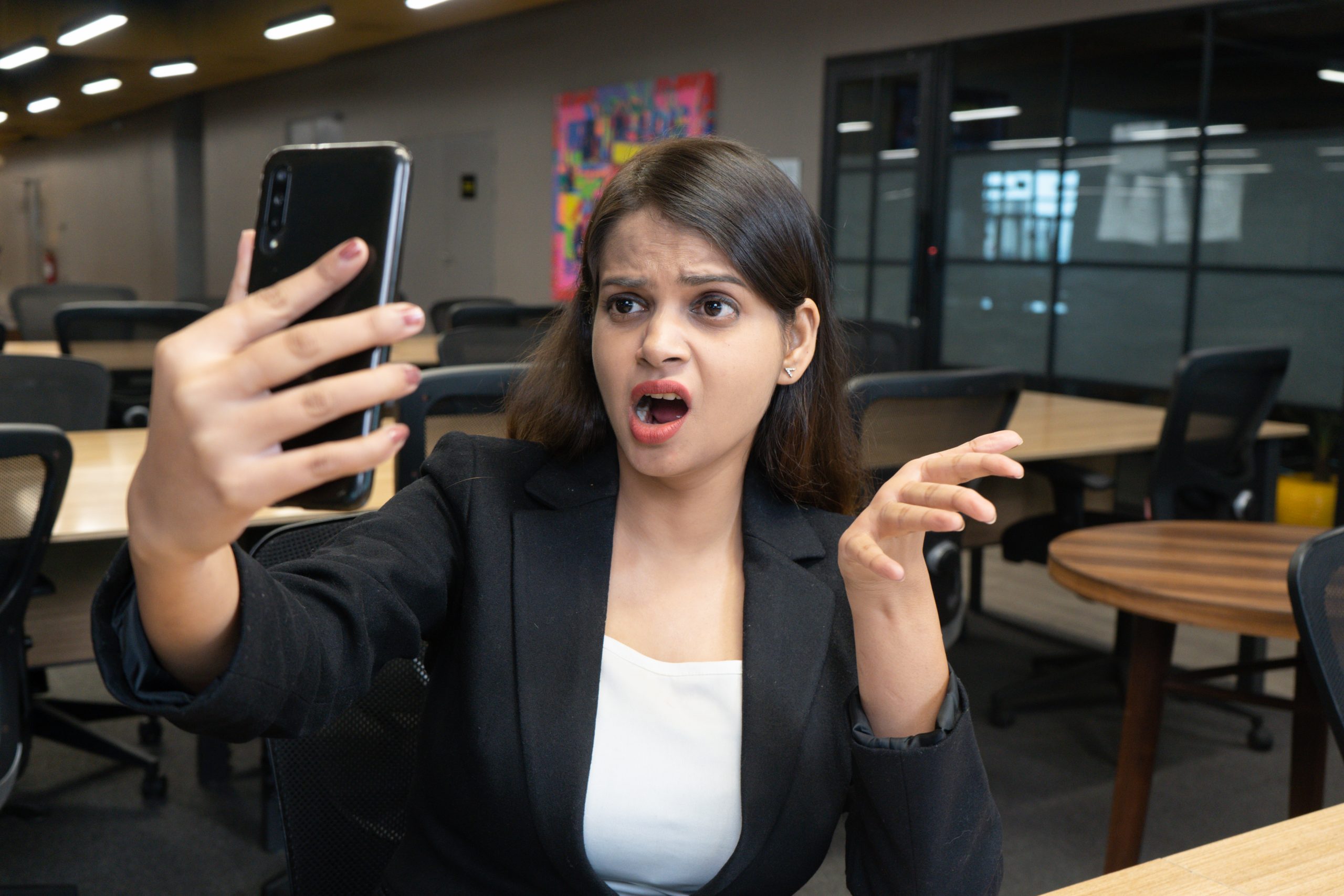 Shocked girl taking a selfie
