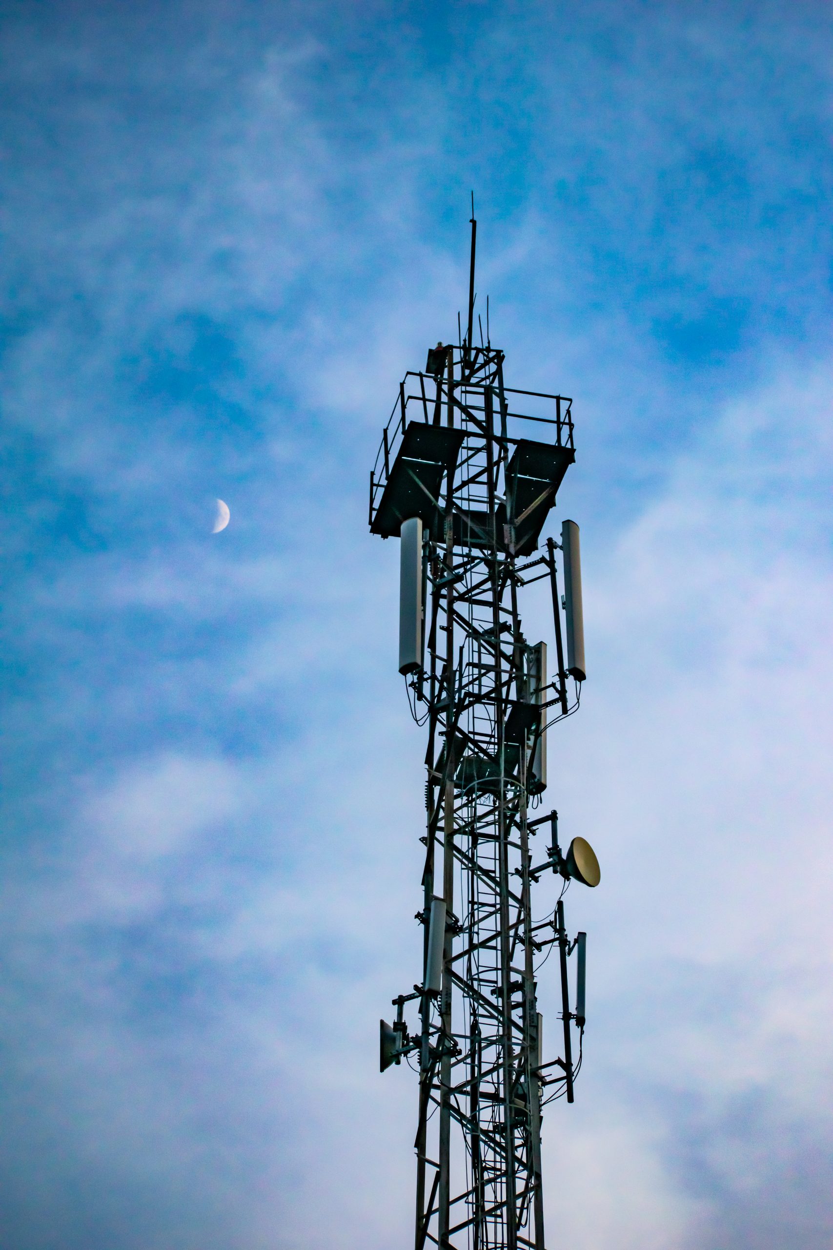 mobile tower and moon