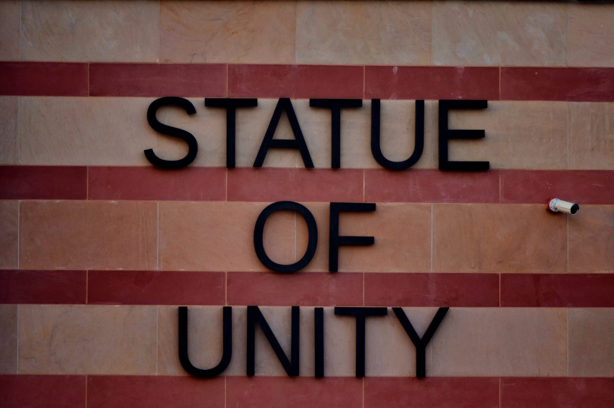 Statue of unity written on a wall