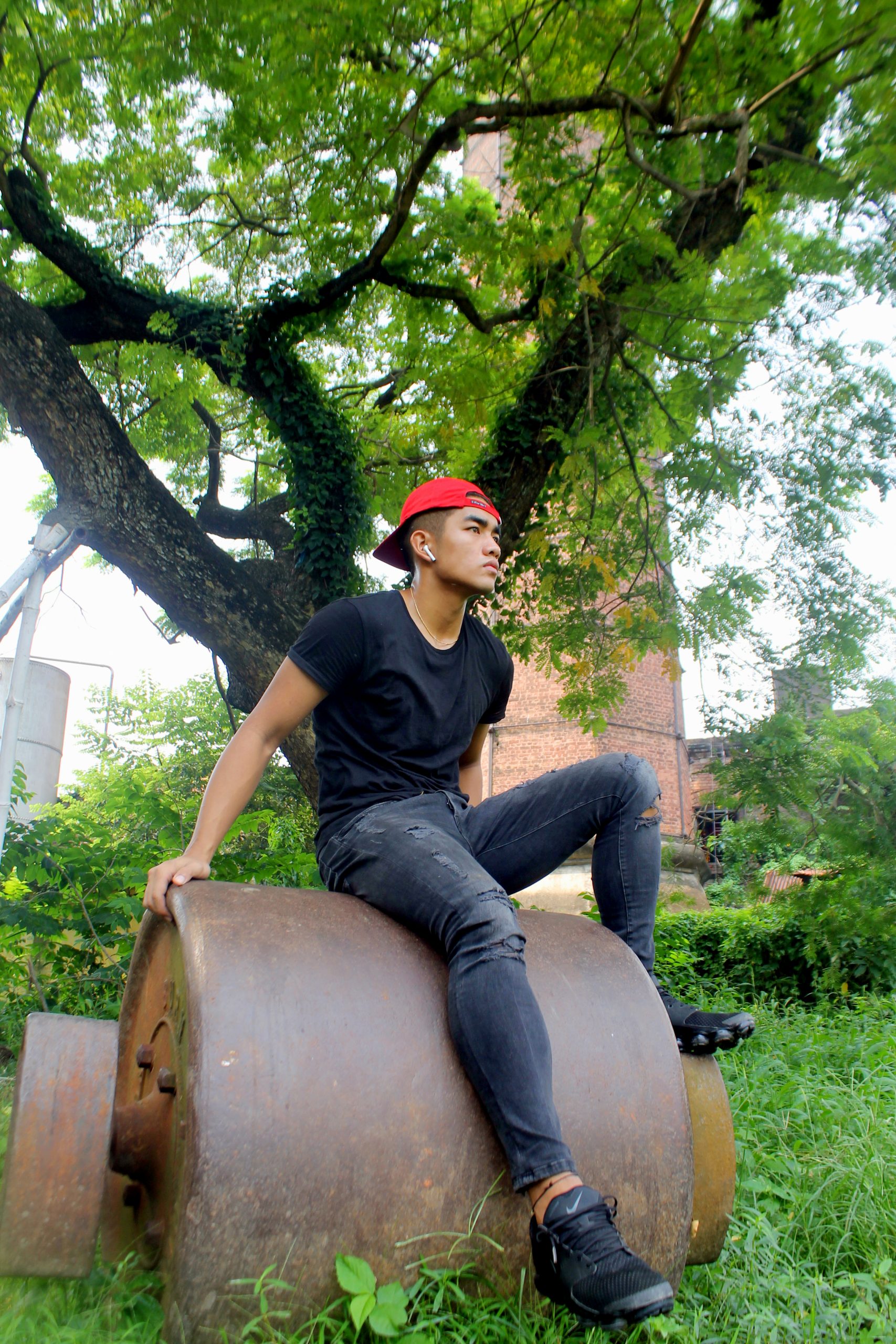 A boy sit on a roller