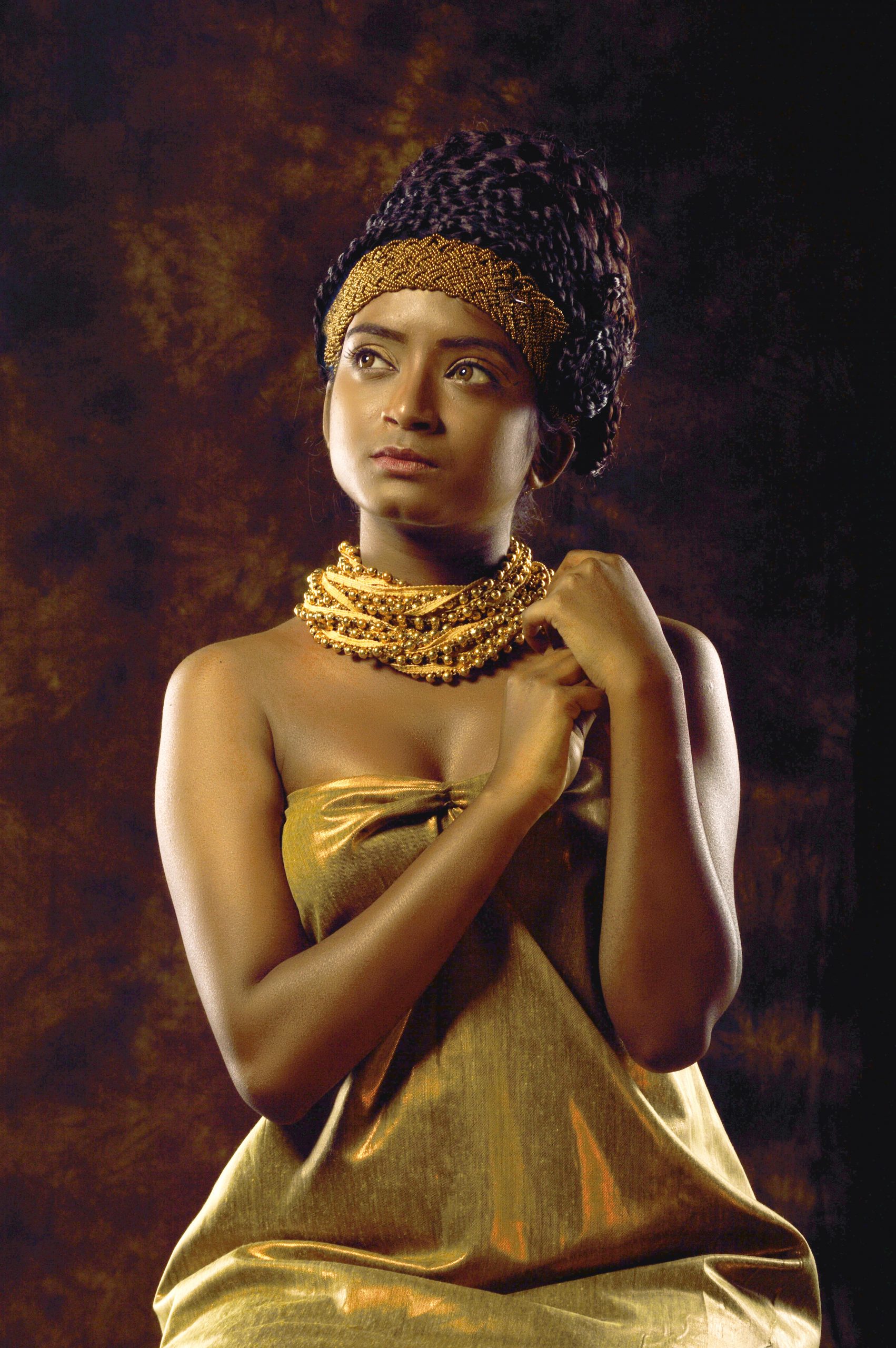 A pretty model dressed as an ancient queen.