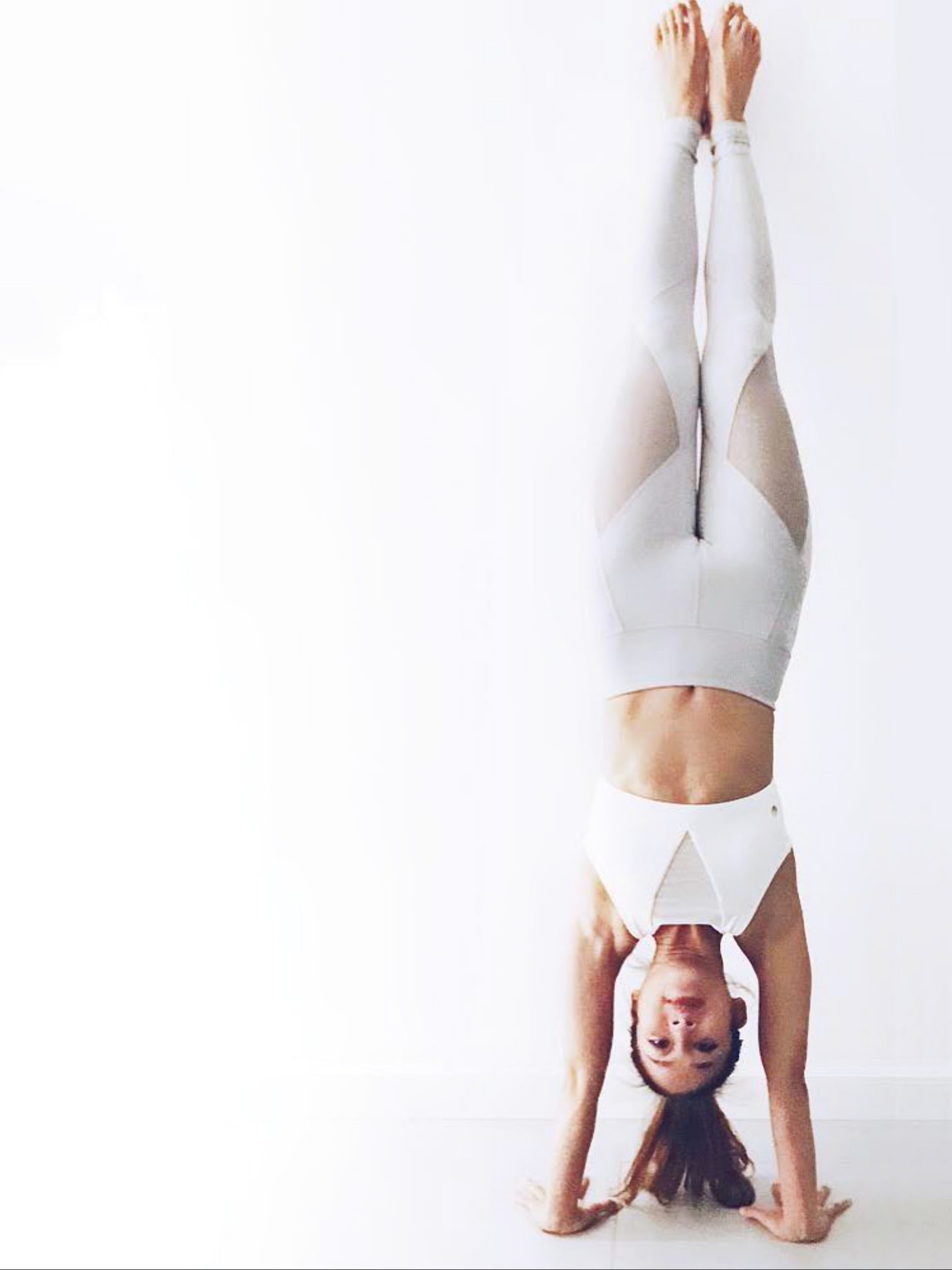 girl doing handstand