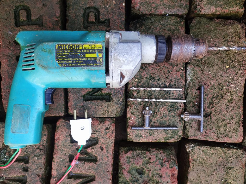 A drill machine with bits - PixaHive