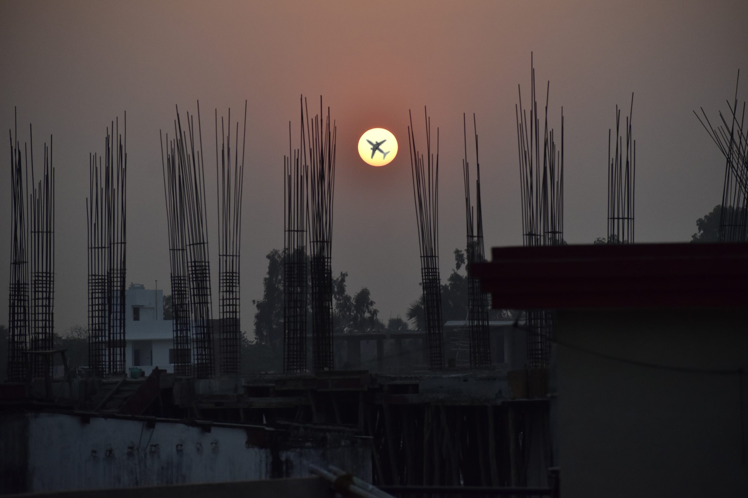 An airplane crossing by the Sun