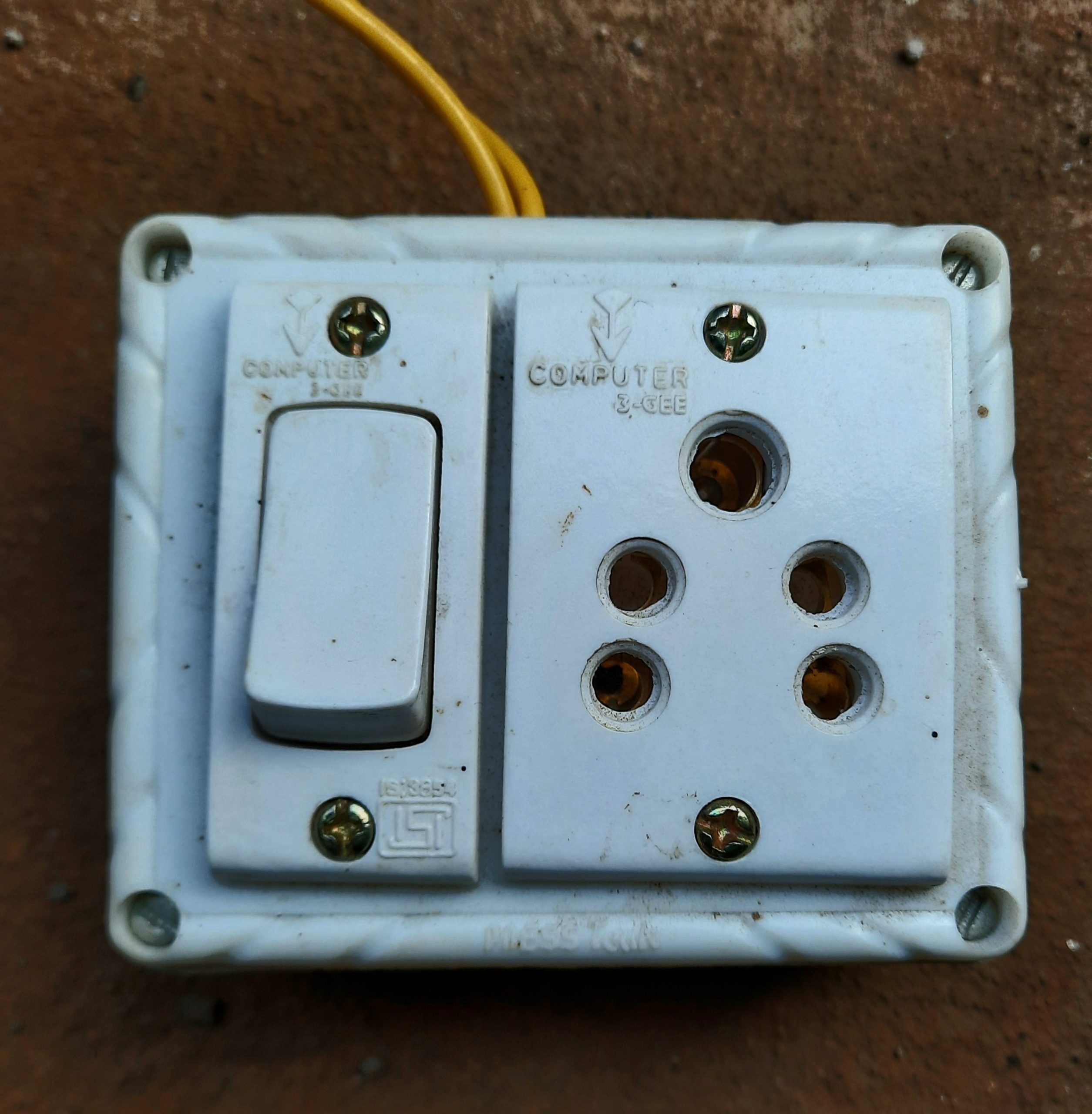 An electric switch and socket