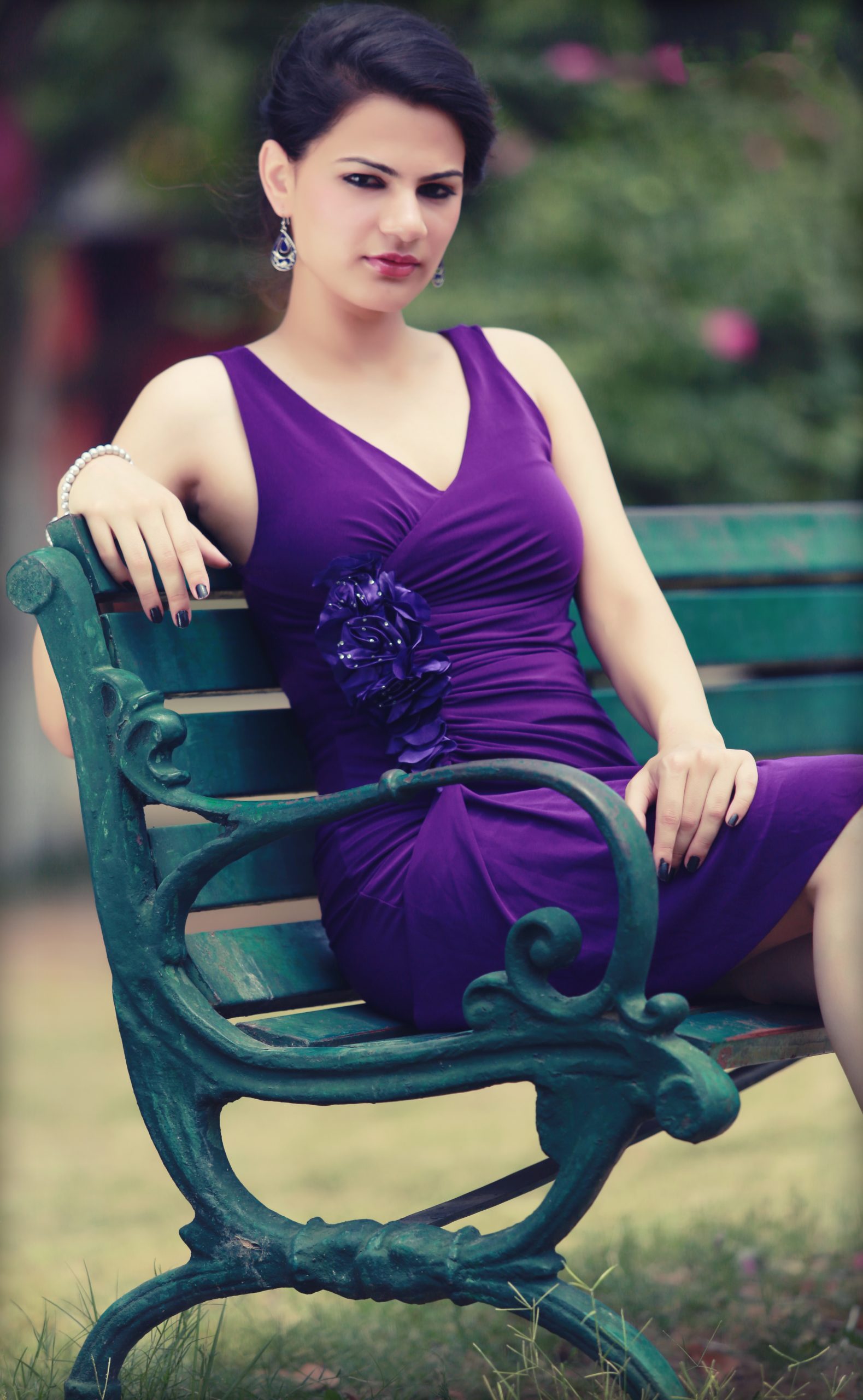 woman posing on bench