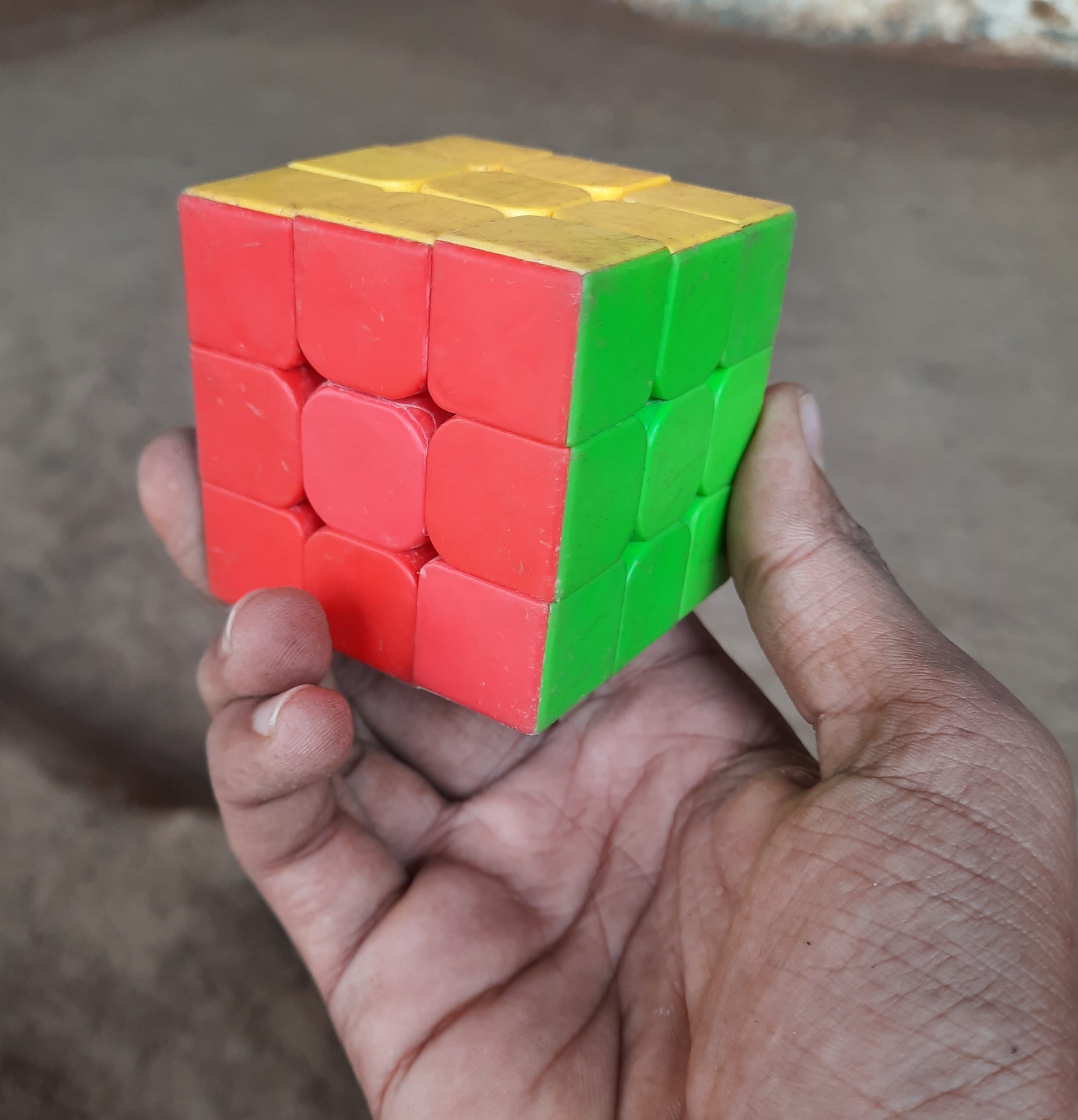 rubik's cube in hand