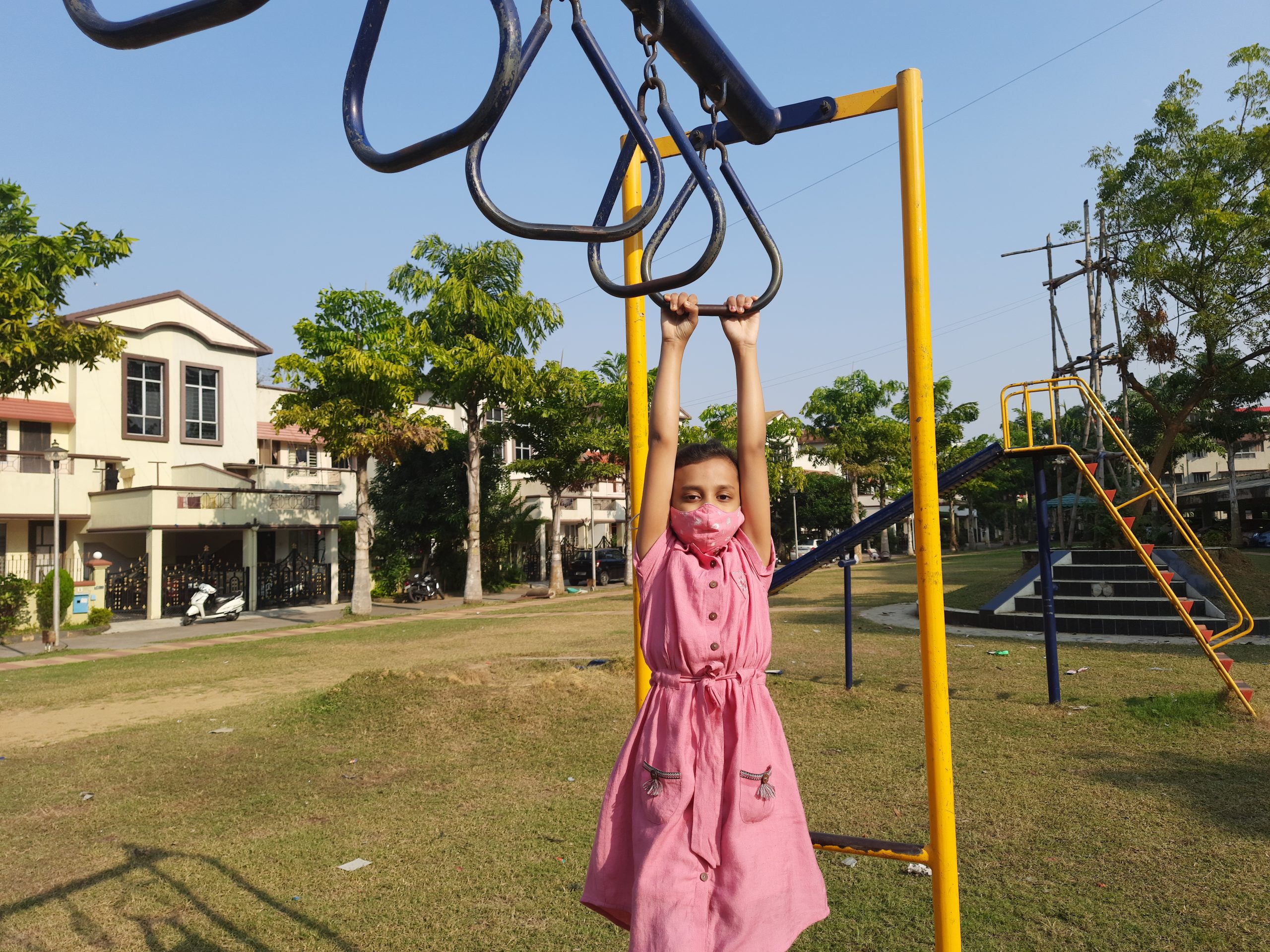 A girl exercising in a park