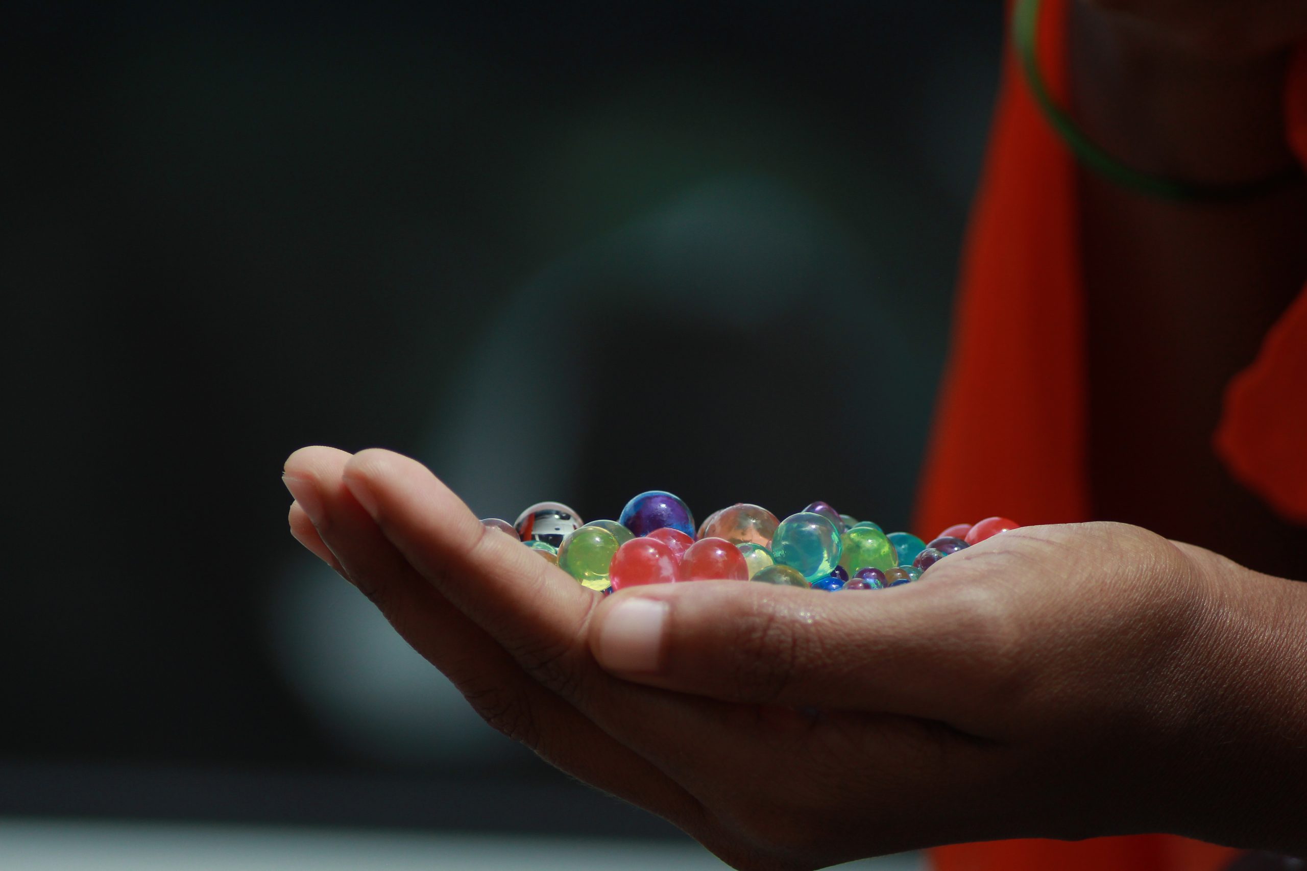 Glass marbles in hand