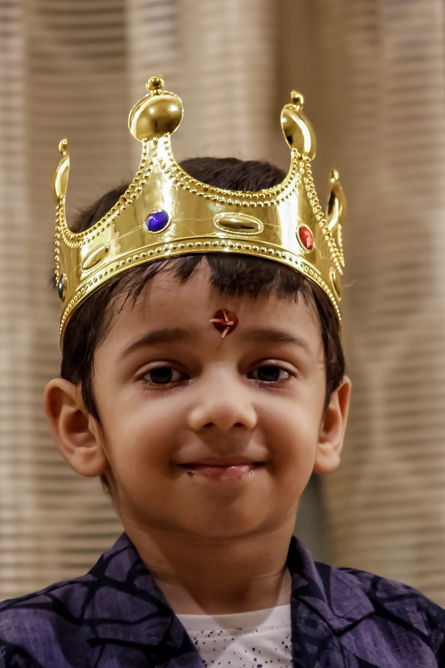 Kid wearing a crown