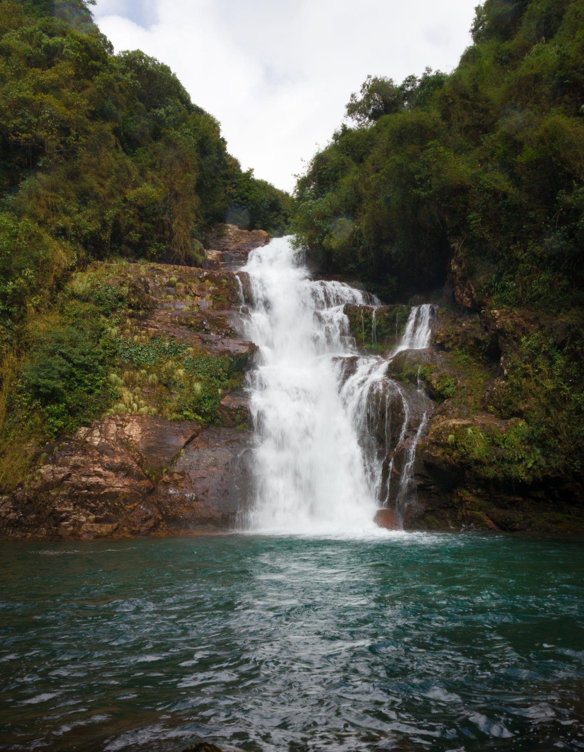 waterfall going into a stream