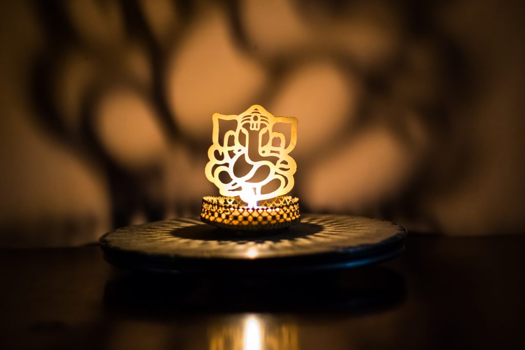 Lord Ganesh figurine with lights - PixaHive