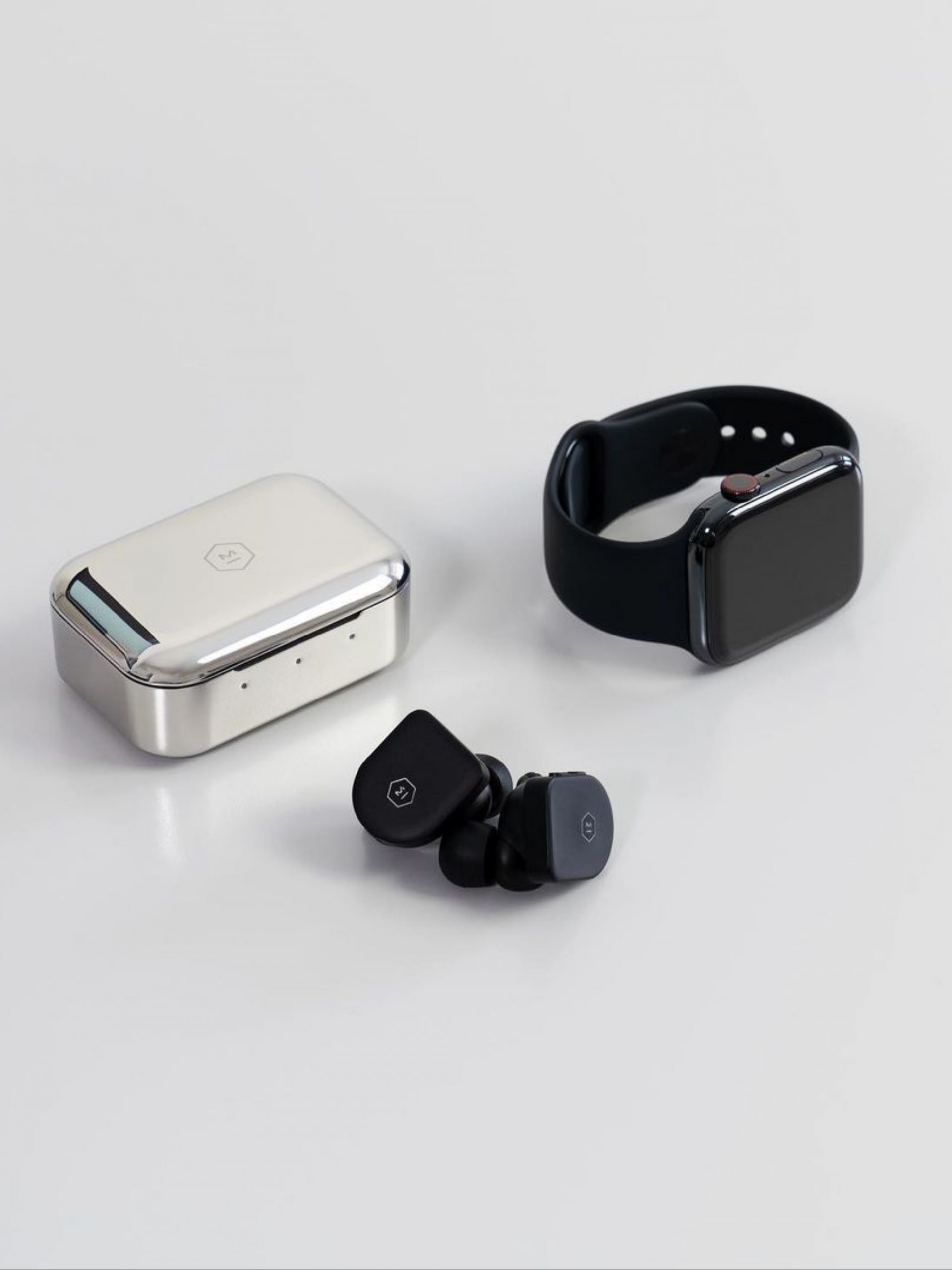 A smartwatch and earpods