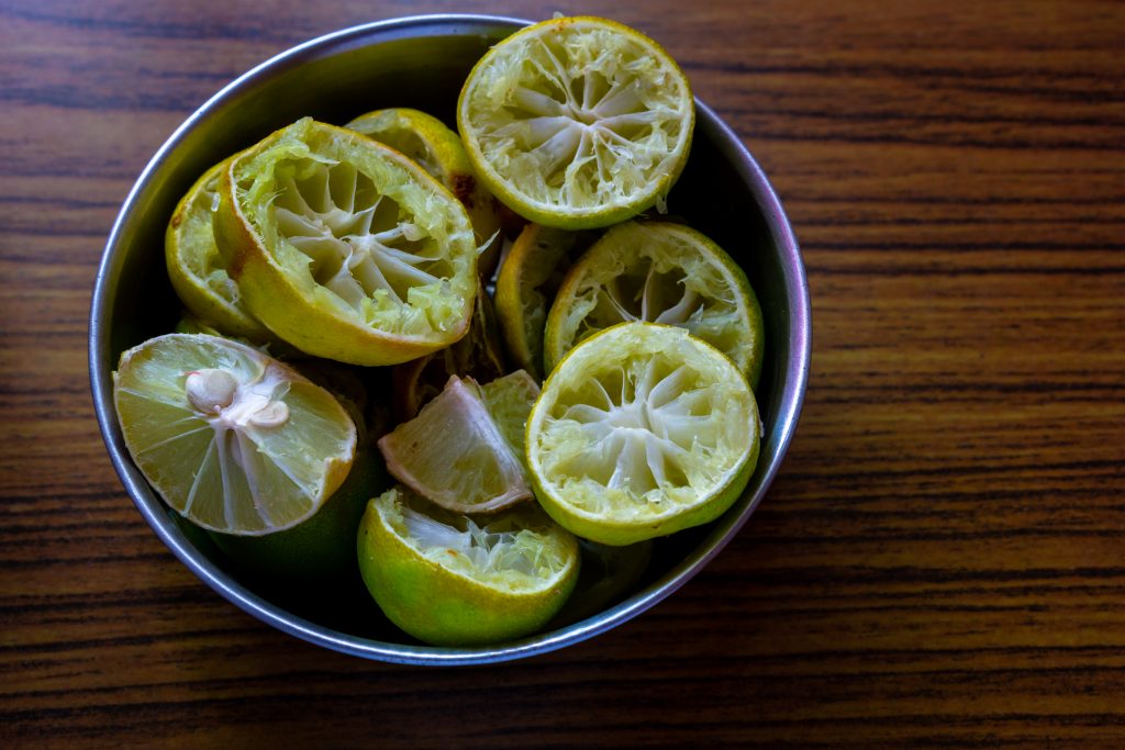 Squeezed lemon pieces in a bowl PixaHive