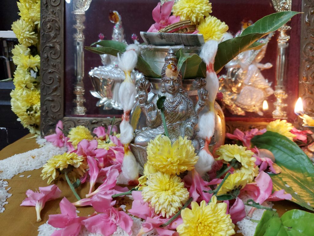 Sri Lakshmi Idol decorated with flowers - PixaHive