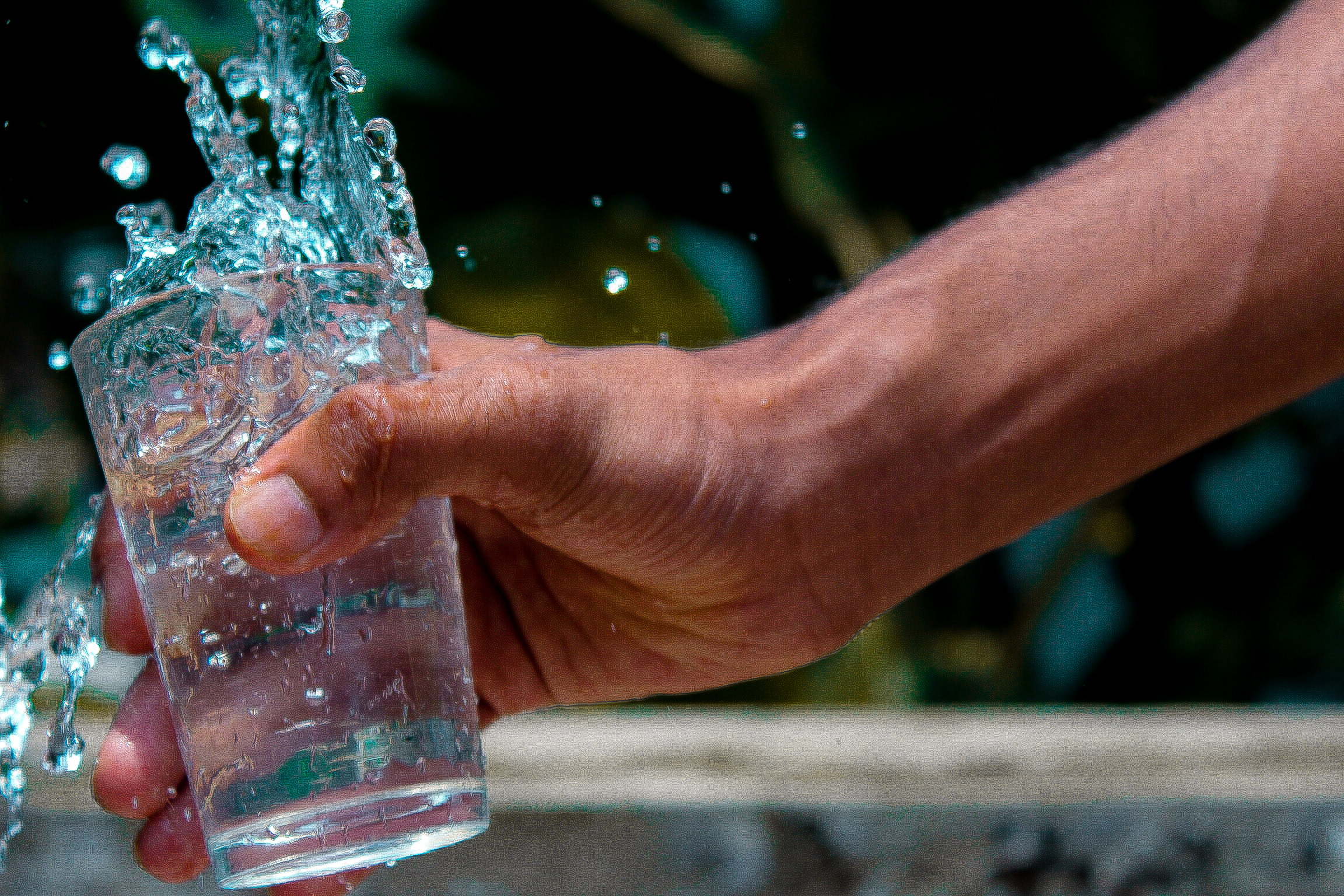 water splashing out of glass