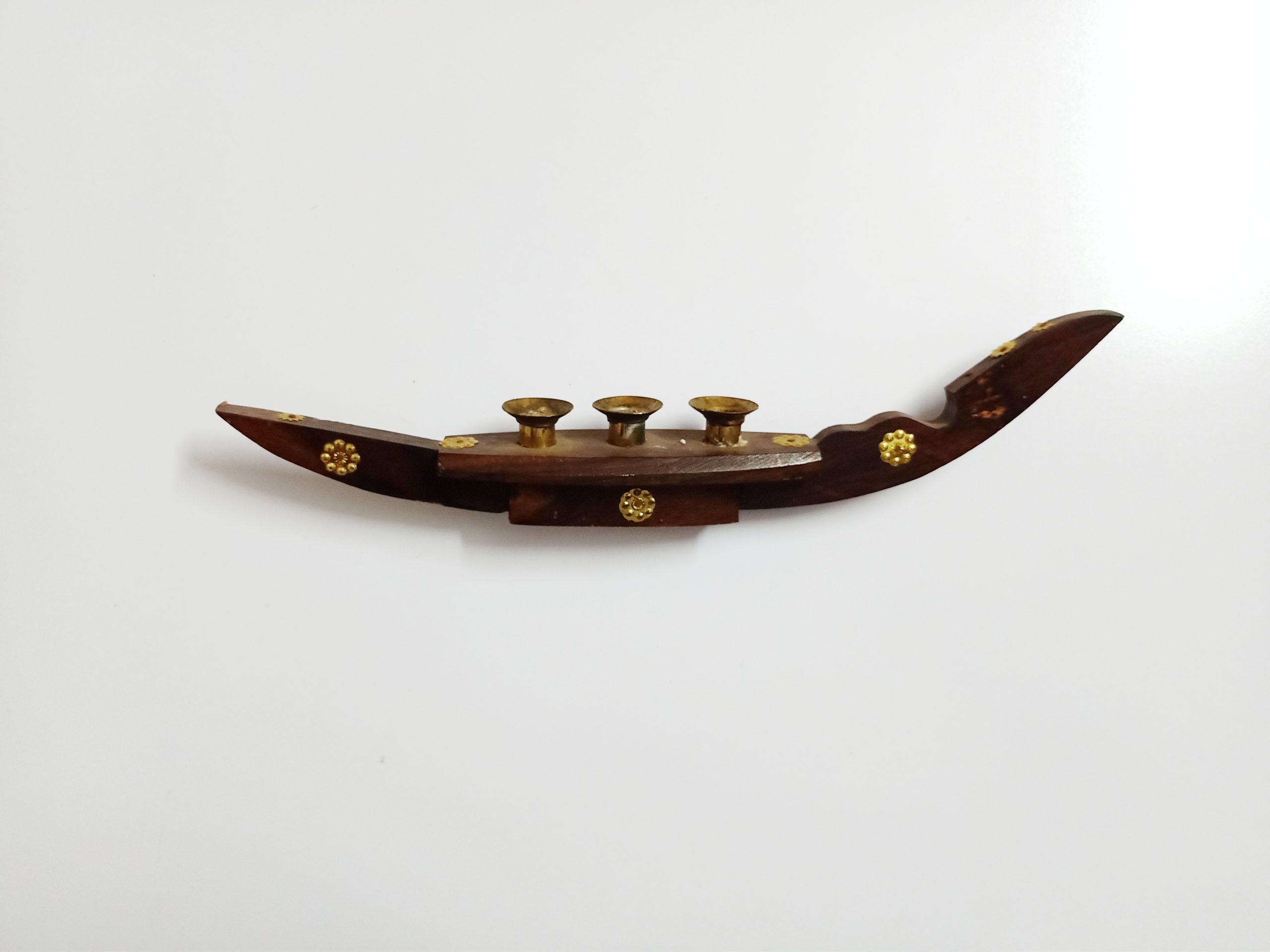 A wooden boat toy