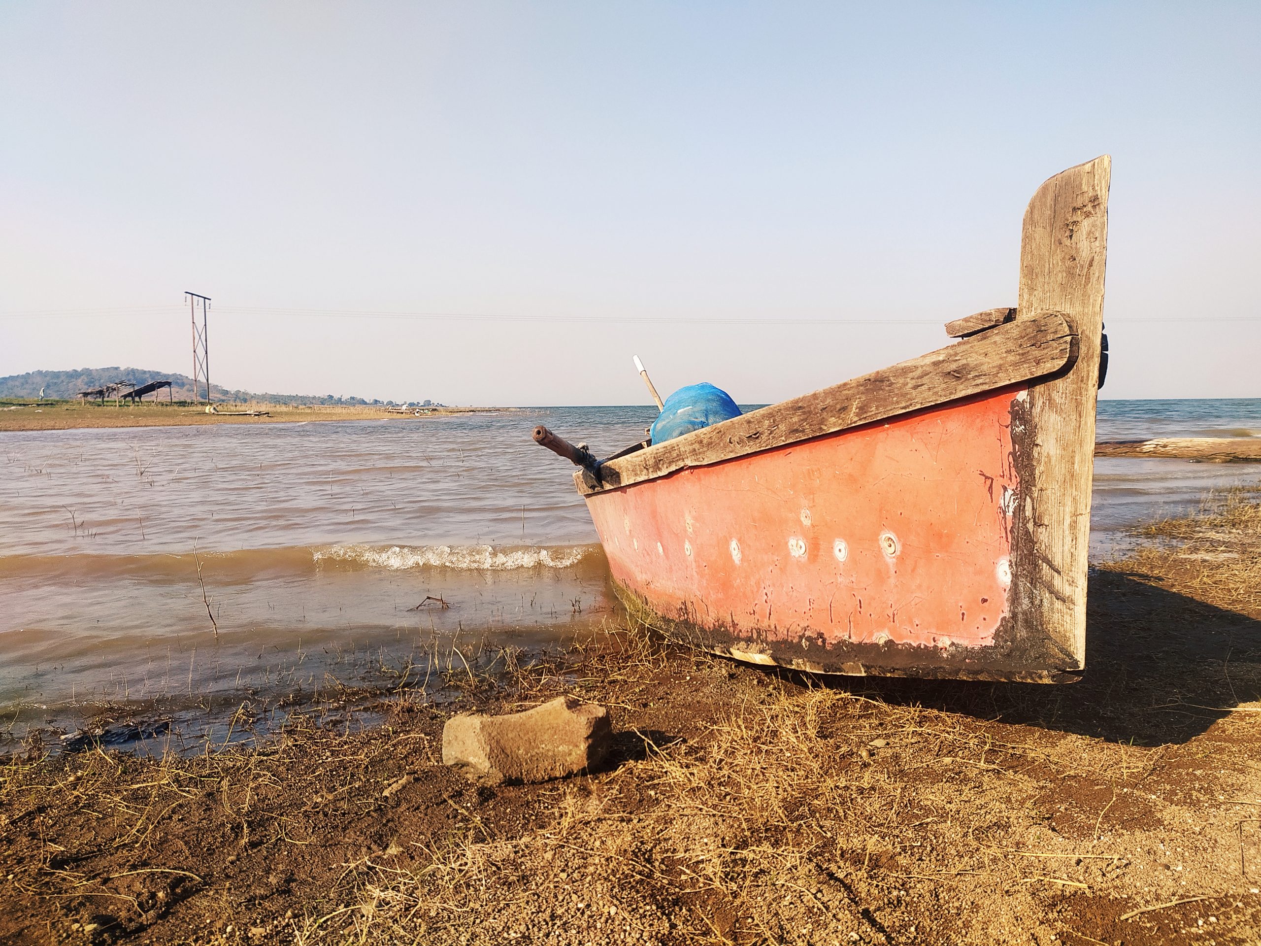 A boat at a riverbank