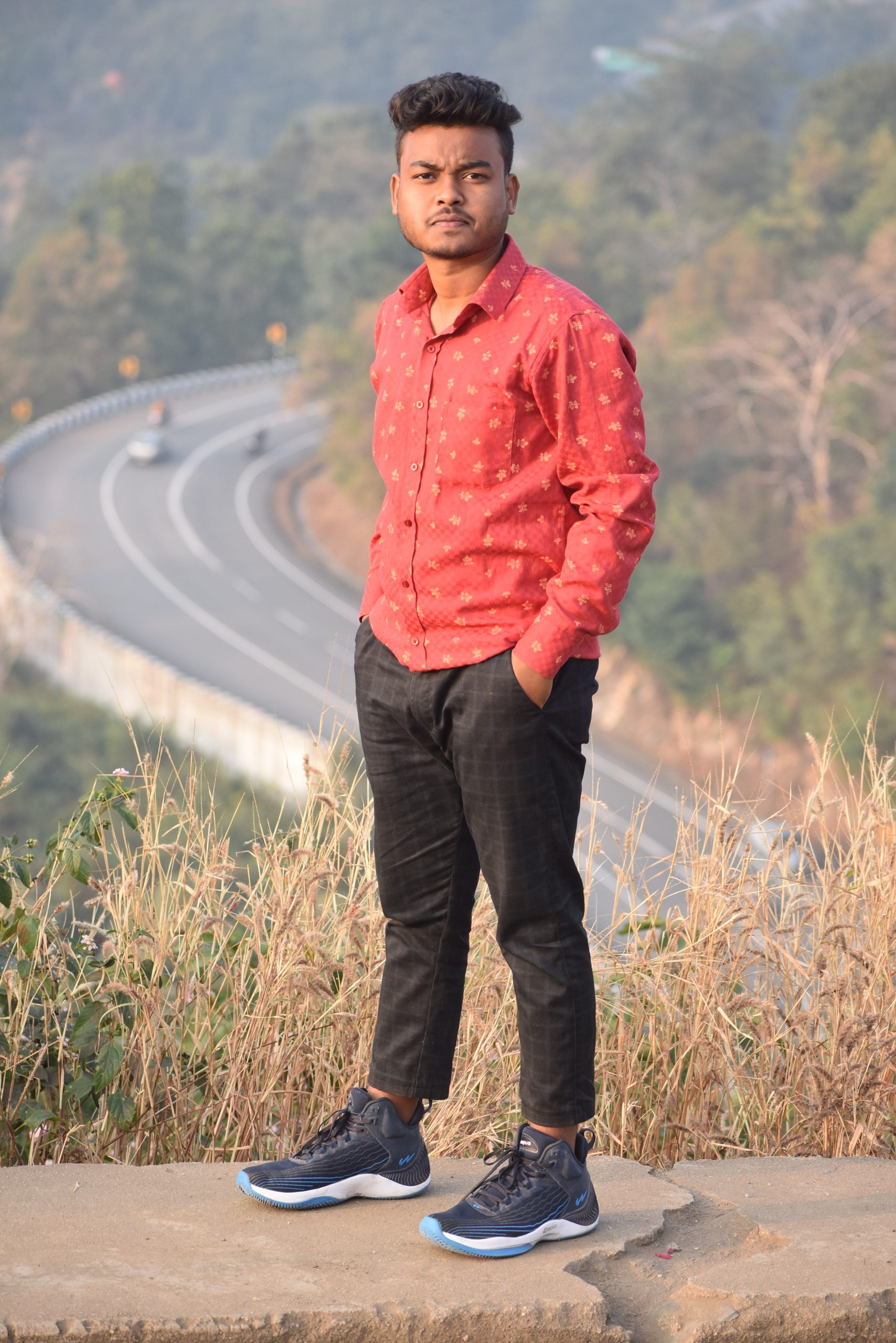 Boy posing on the road