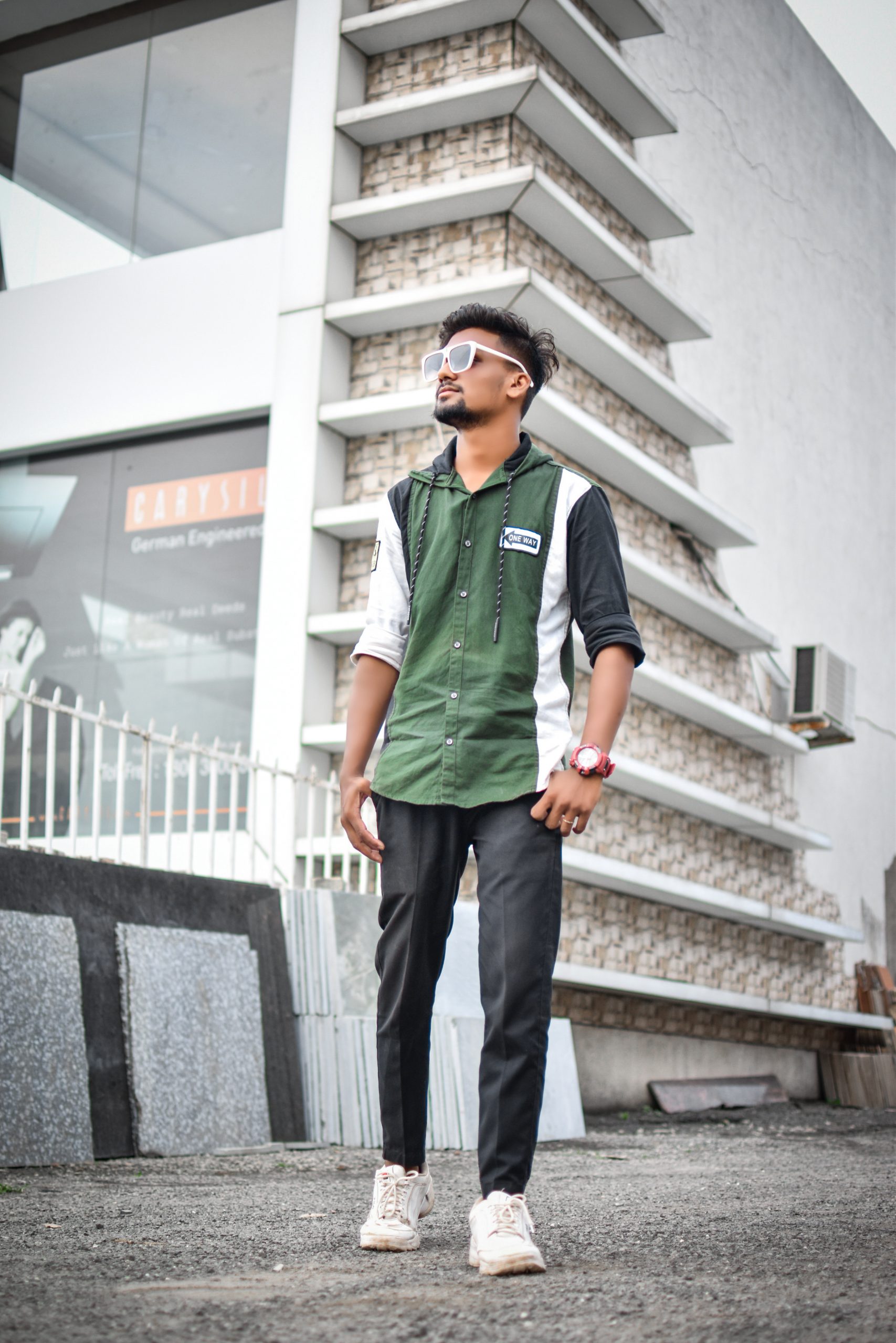 A boy near a building