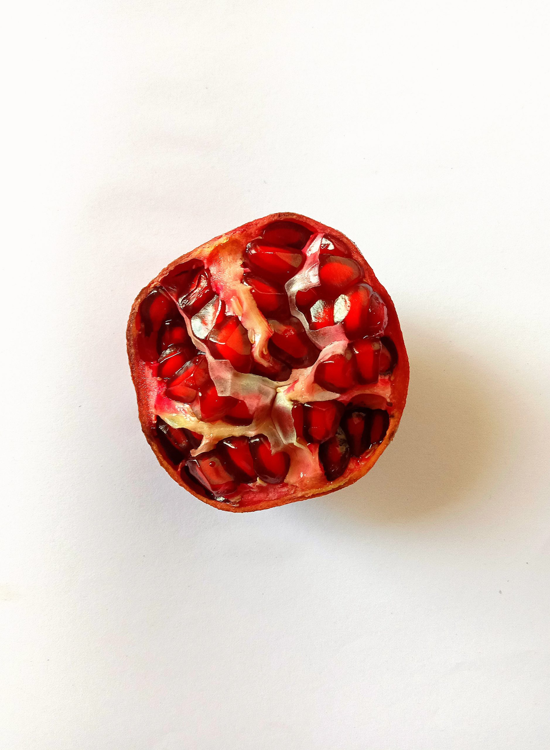 A cut piece of pomegranate