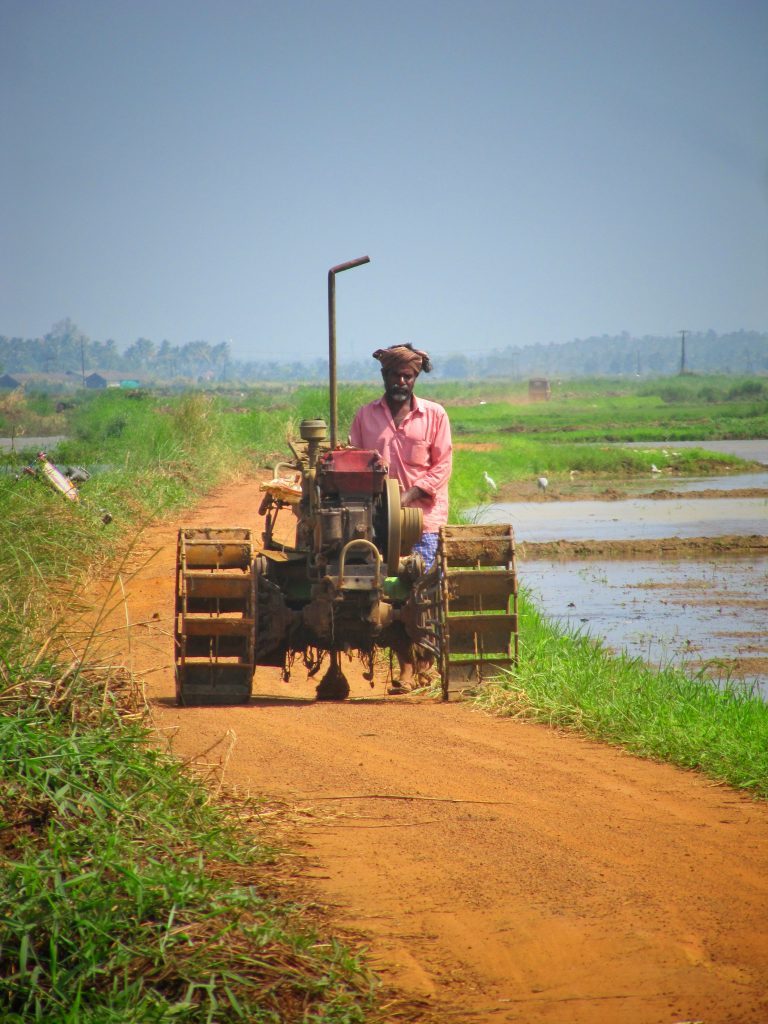 A farmer with farming machine PixaHive