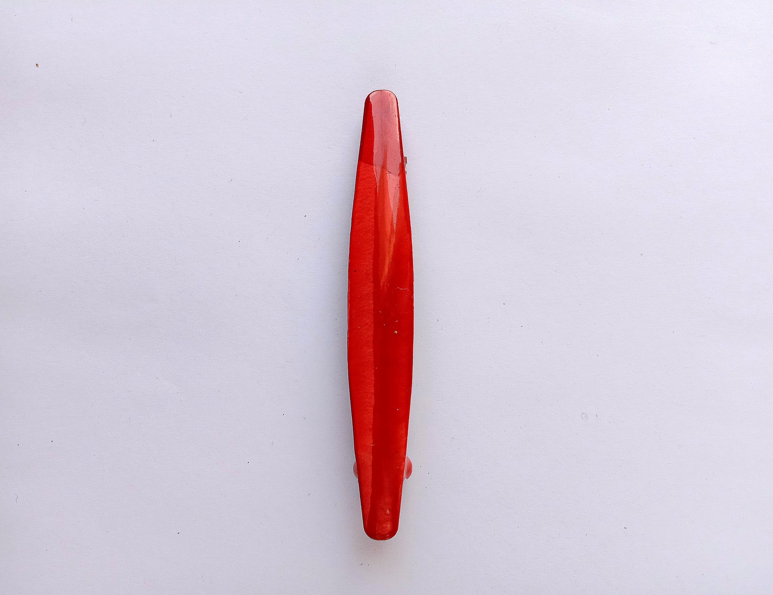 A red hair pin