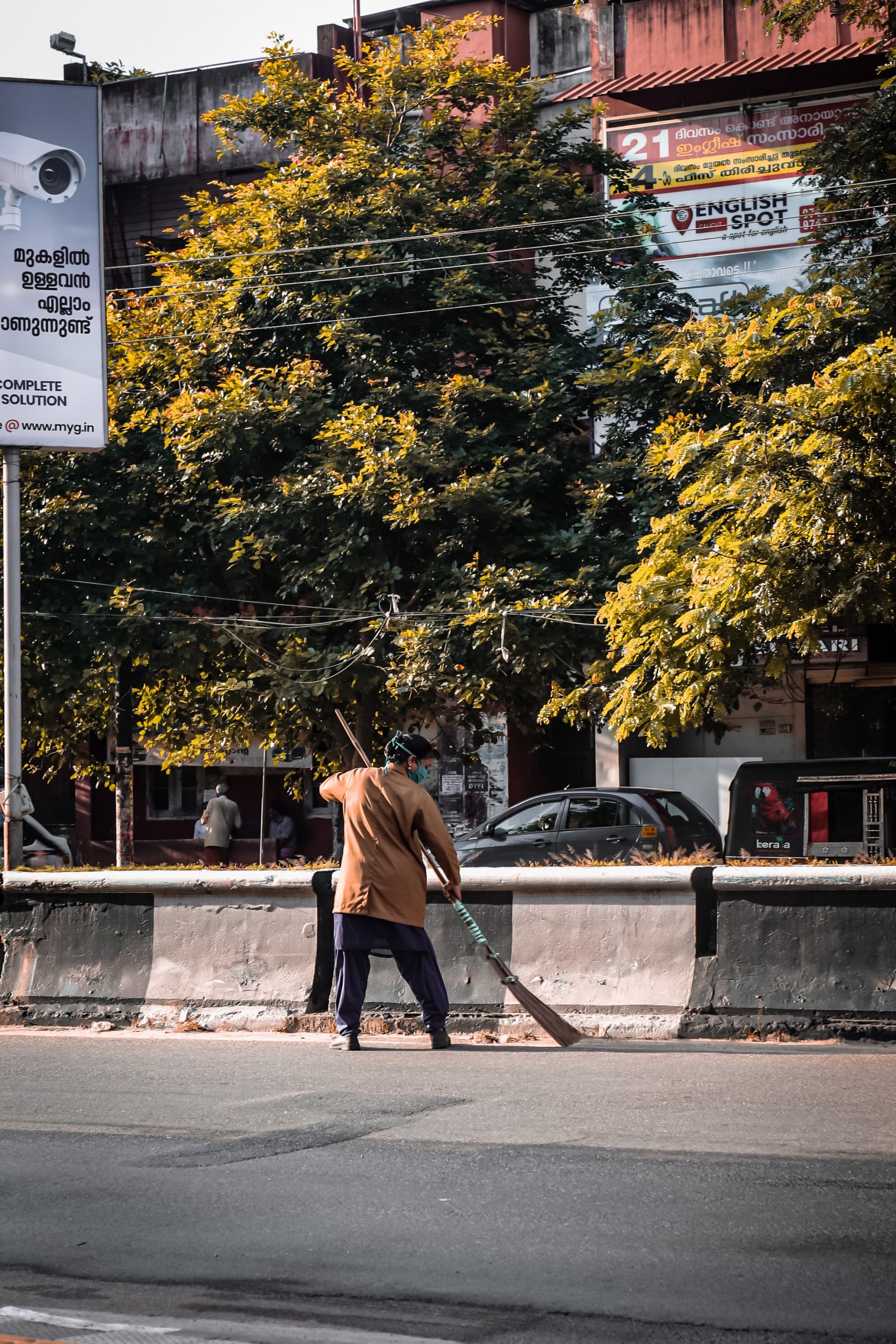 A man cleaning the road