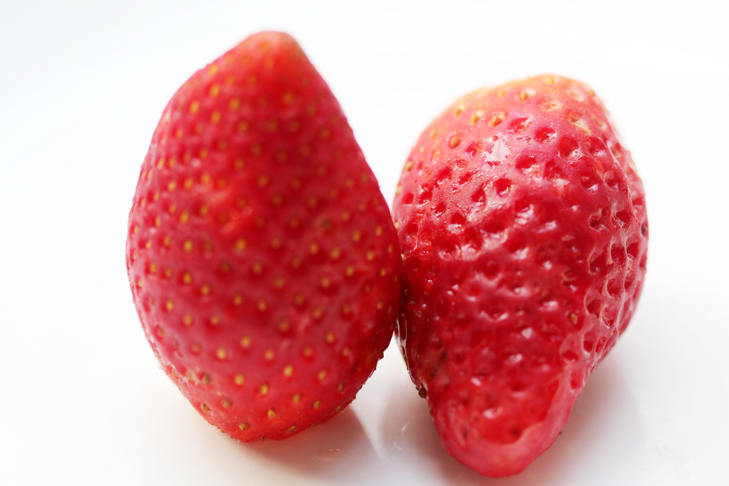 A pair of strawberries