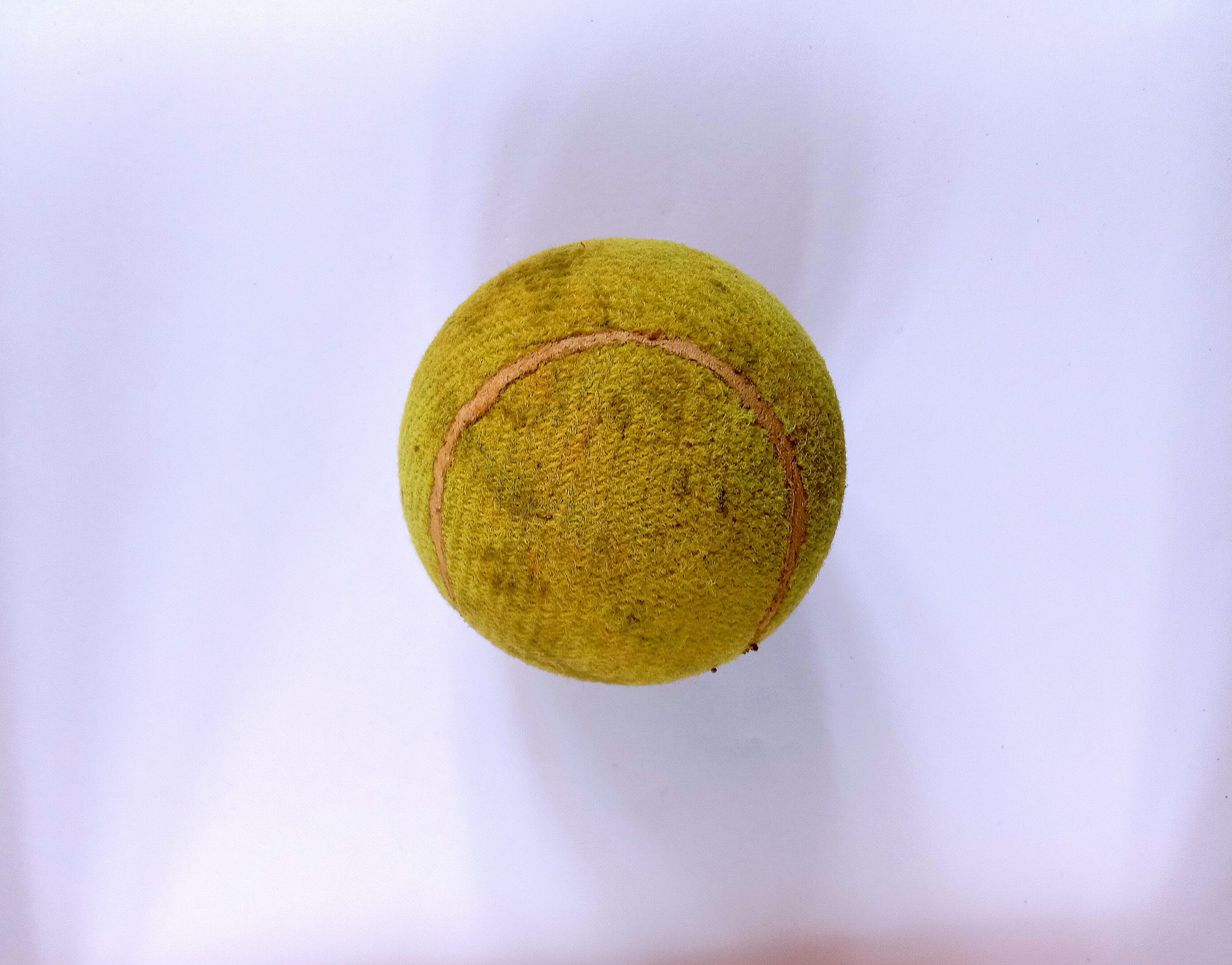 dirty tennis ball
