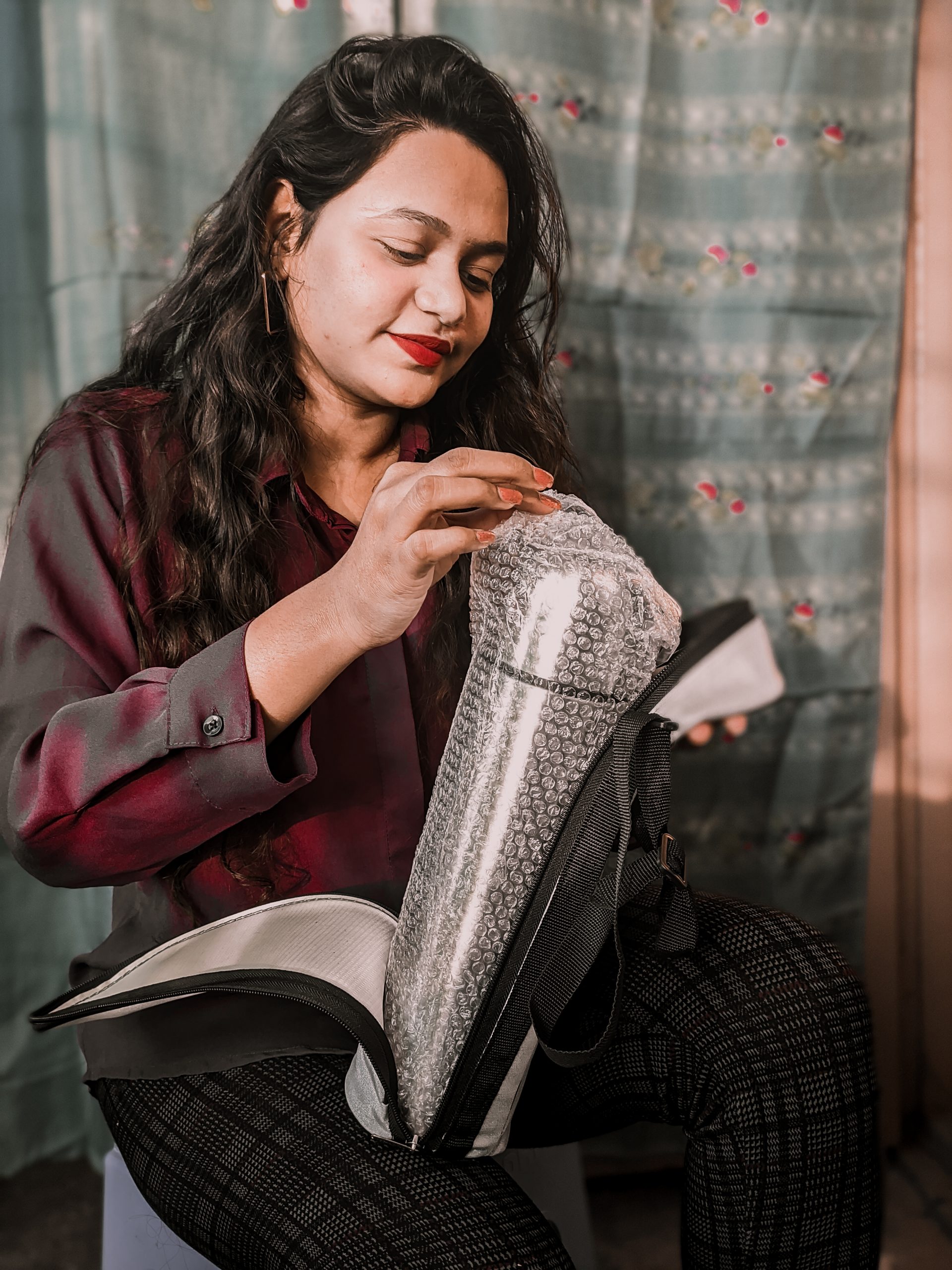 A woman opening new thermos