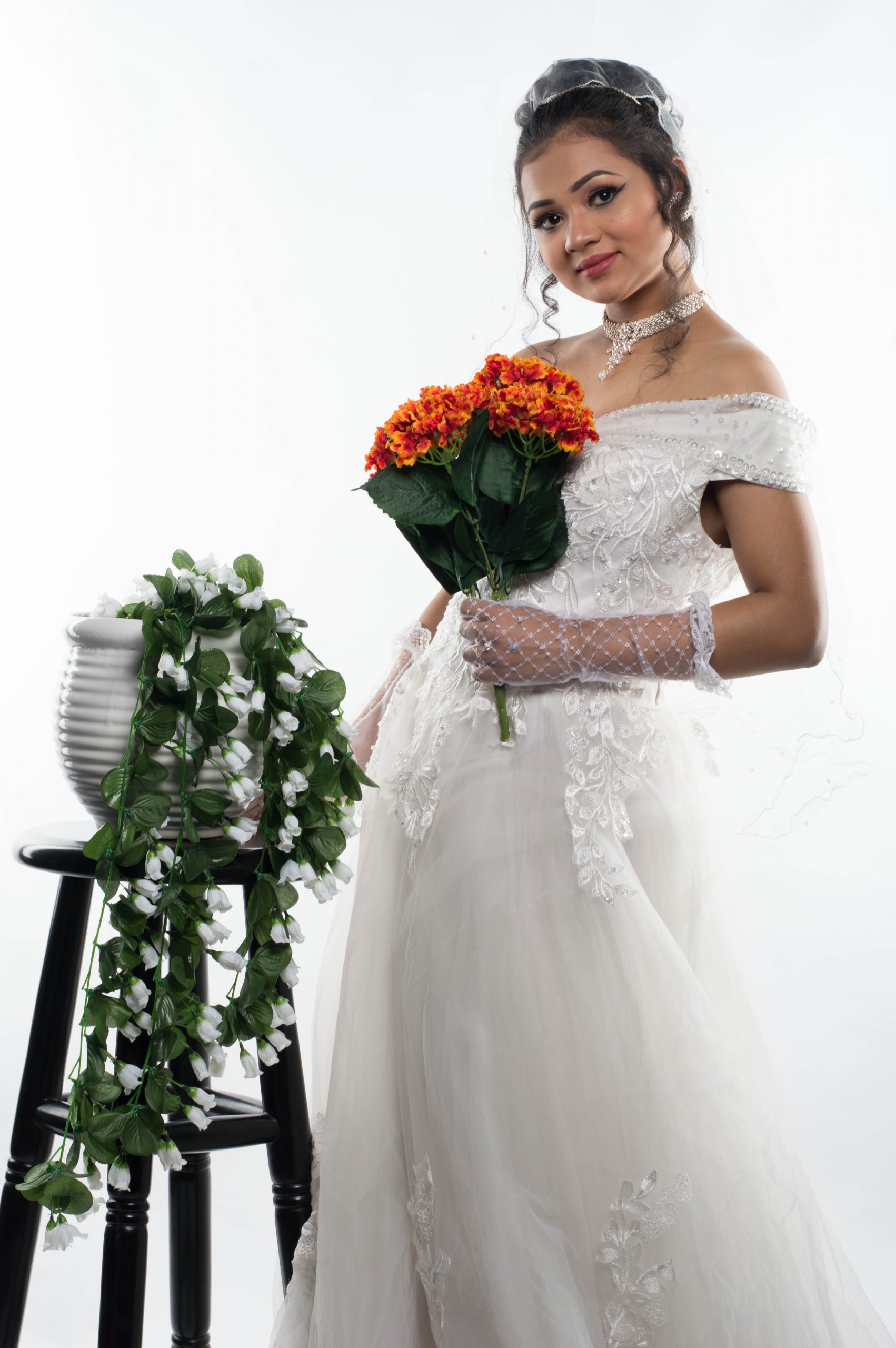 bride posing with a bouquet