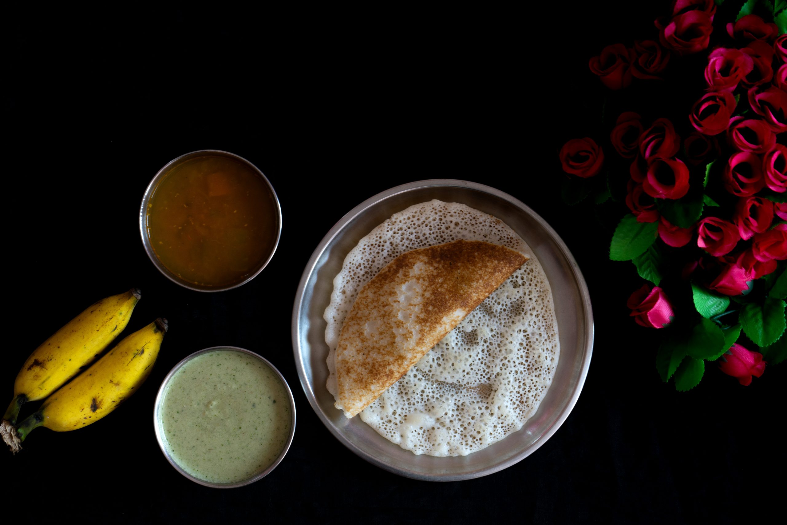 dosa with sambar, chutney and bananas